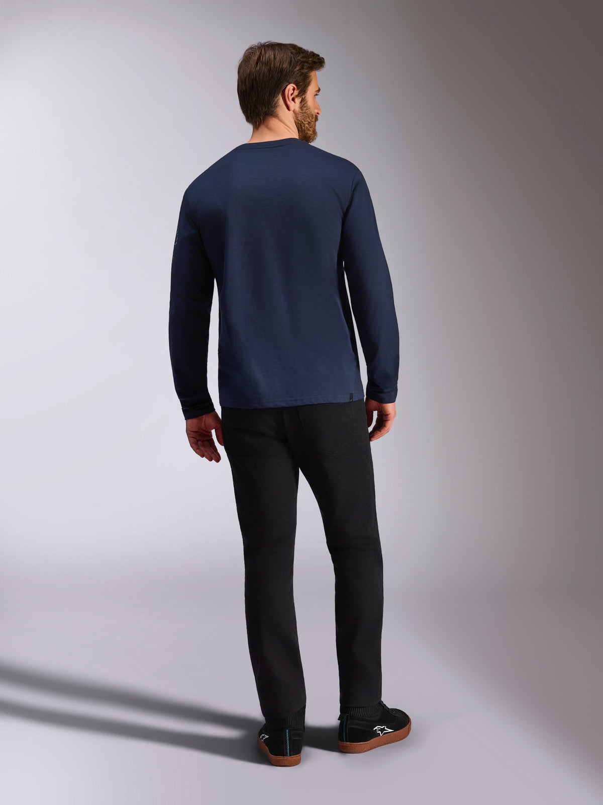 Alpinestars Mandatory CSF Long Sleeve Tee, Navy Blue, back view, worn with black pants, casual motorsport-inspired streetwear