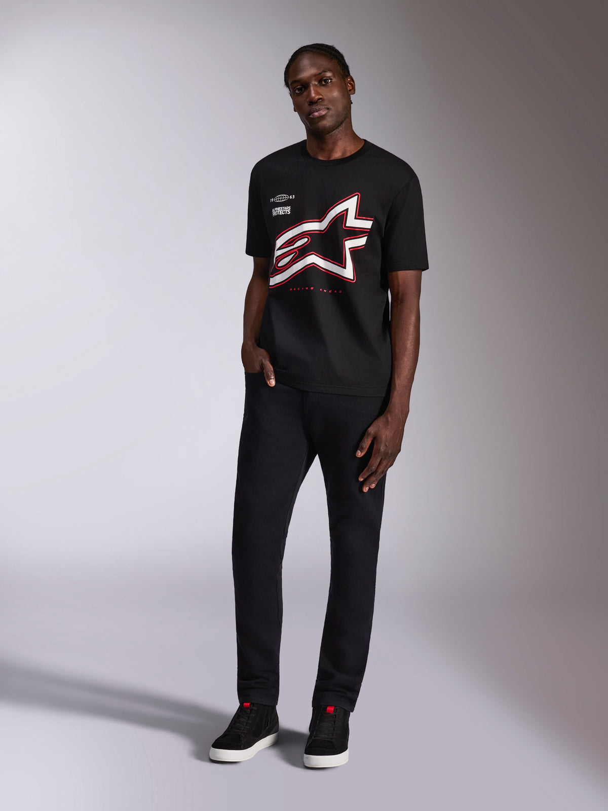 Alpinestars Authority CSF Tee, Short Sleeve T-Shirt, Black, Large Cropped Astars Logo with Red and White Outlines, worn by a model, Casual Motorsport Streetwear