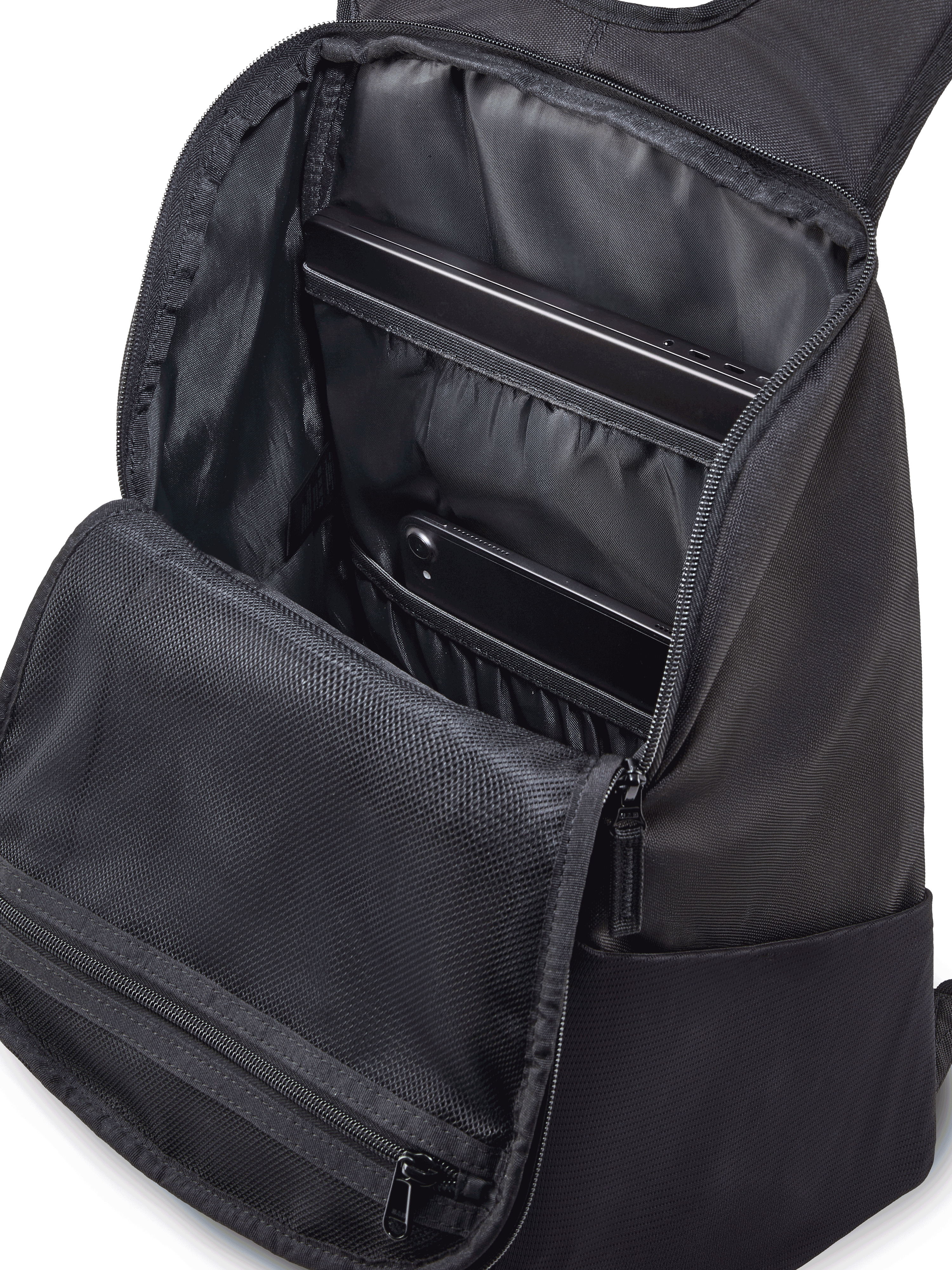 Alpinestars Defcon V3 Backpack, Black and White small daily backpack, durable 600D polyester, featuring front zipper pocket, mesh water bottle pockets, and printed Alpinestars branding.