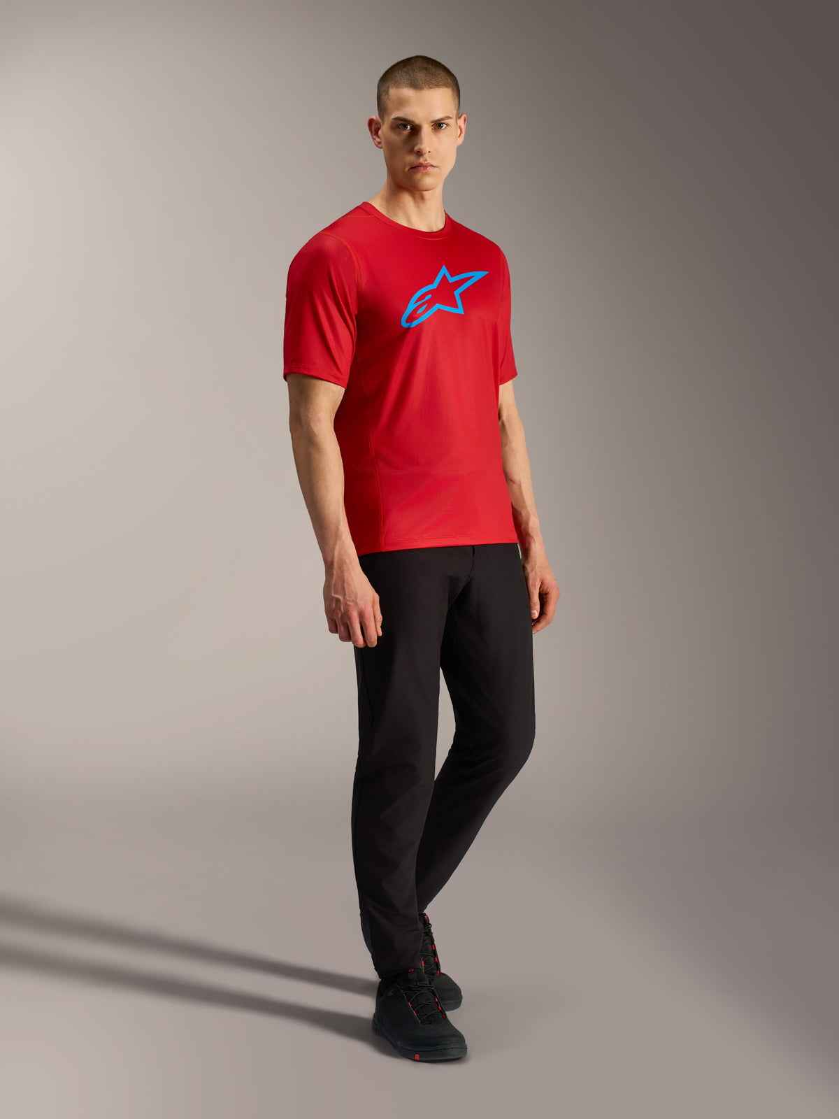 Red A-Dura Ride Short Sleeve Jersey with blue Astars logo, lightweight jacquard fabric, performance MTB apparel.