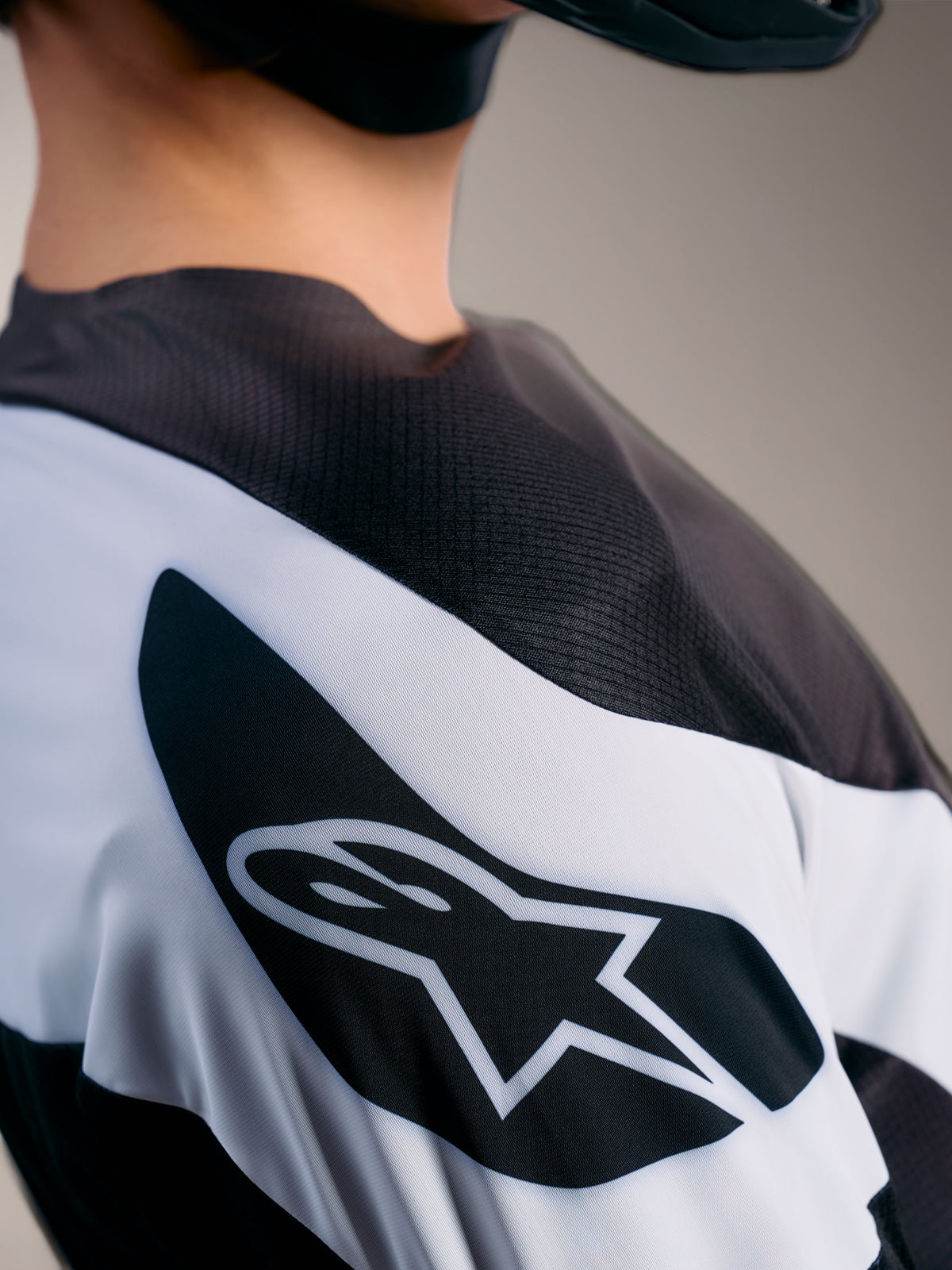 Alpinestars A-Supra Elite Jersey in Gray Fade, featuring breathable micro-perforated fabric and the ASTARS logo.