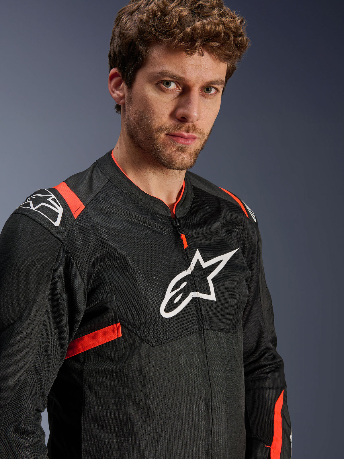 Alpinestars T-SPS Air V2 Men's Mesh Motorcycle Jacket, Black and Red Fluo, Tech-Air Ready, worn by model.