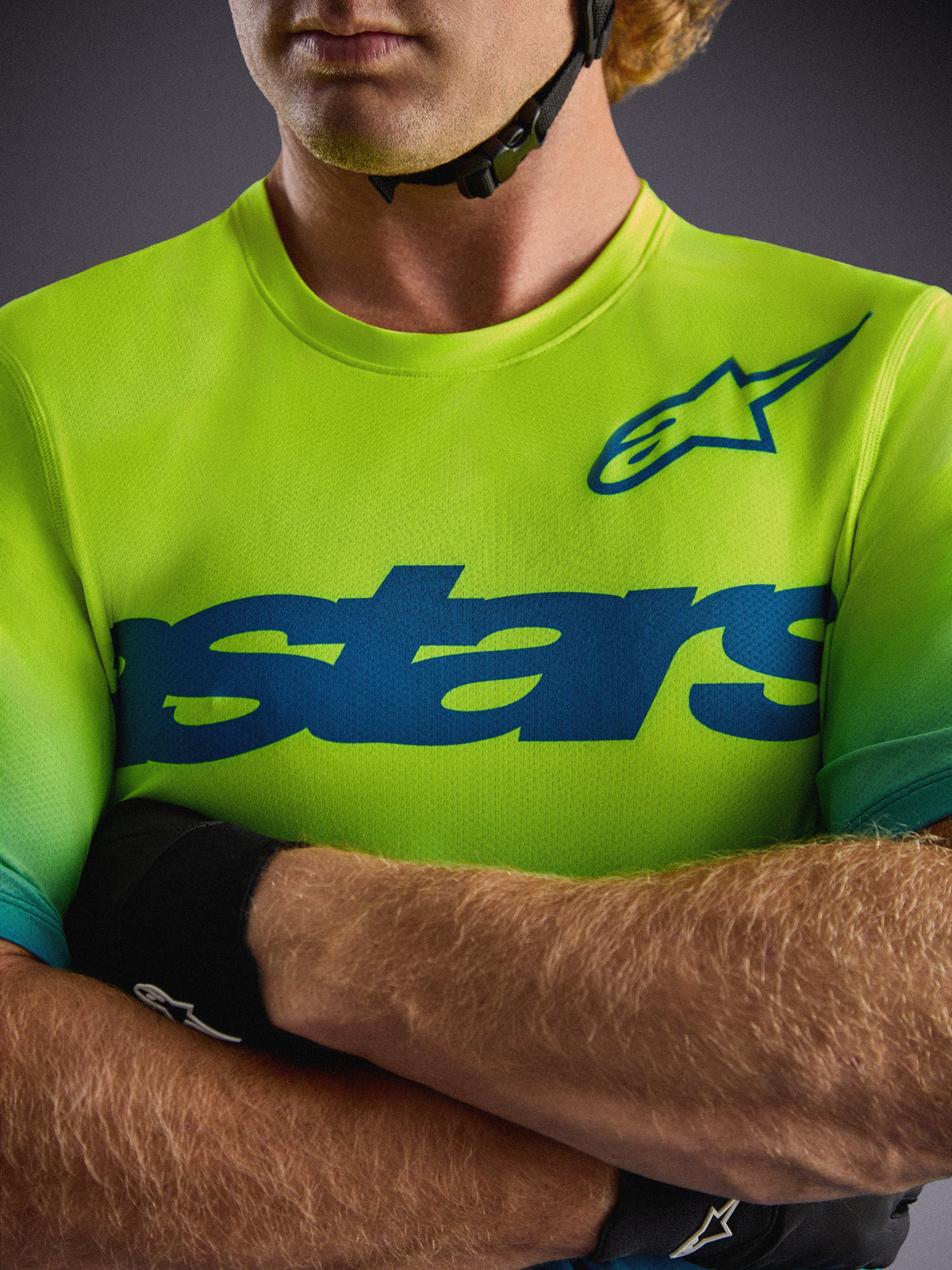Alpinestars A-Dura ASTARS Jersey 2.0 in Yellow Fluo, short-sleeve MTB top with blue graphics and performance stretch fabric.