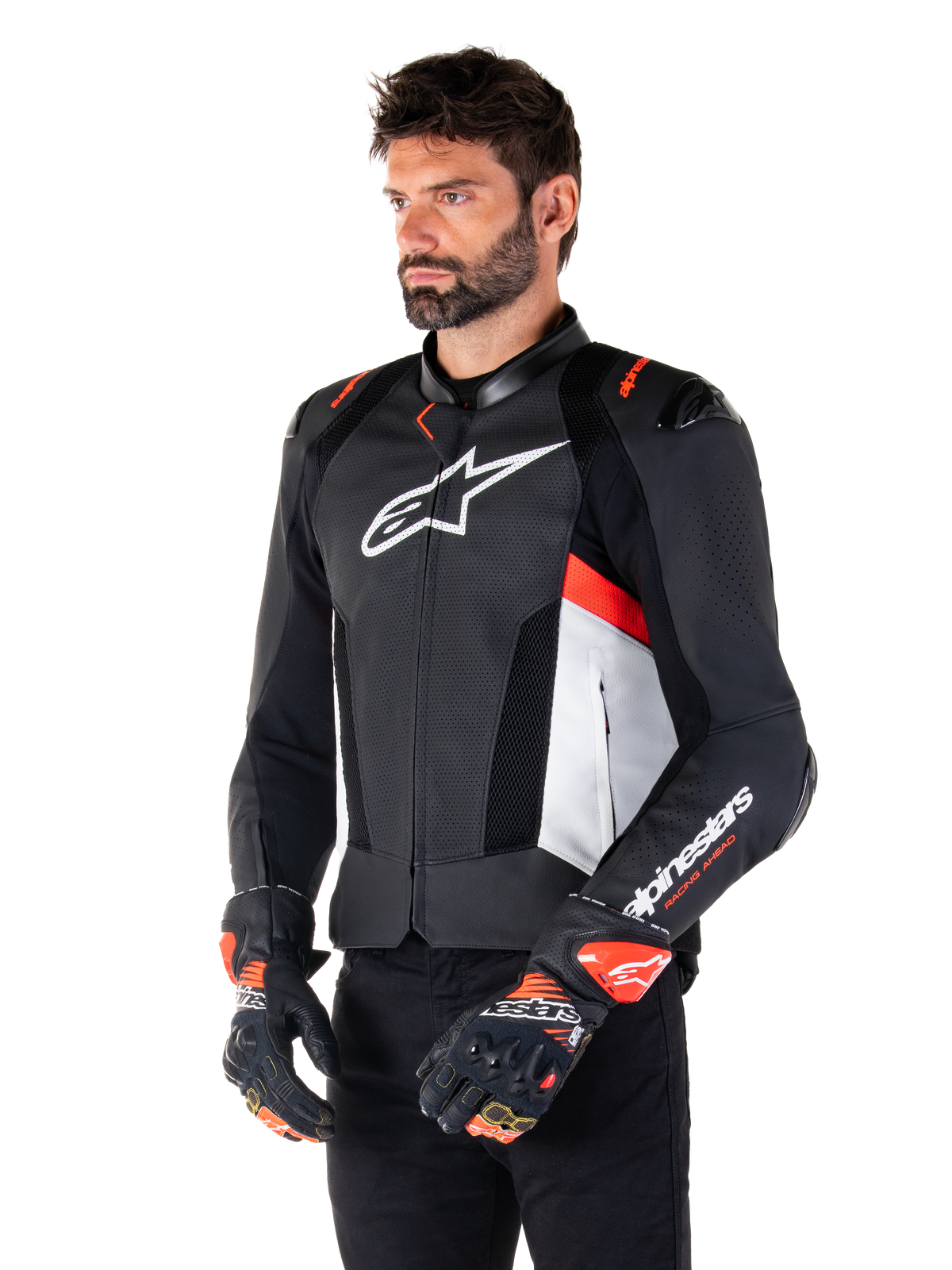 Alpinestars Missile V3 Airflow Leather Jacket, Black White and Red Fluo, Racing Sport Motorcycle Jacket, worn by model with matching gloves, featuring perforated leather panels, large white chest logo, and black shoulder sliders.