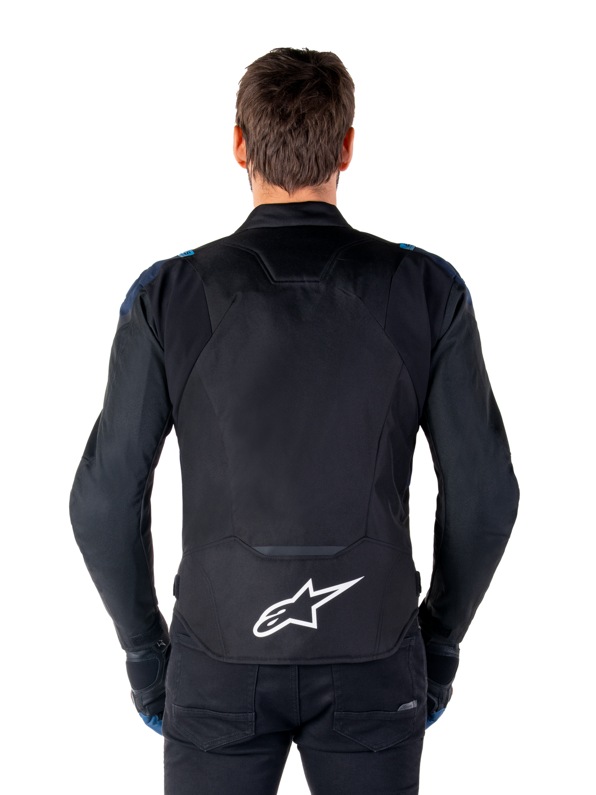 Alpinestars T-Jaws V4 Waterproof Jacket, Motorcycle Jacket, Black Dark Blue Blithe Blue, back view on a model, featuring a large white Alpinestars logo on the lower back, dark blue shoulder accents, and a sleek sport silhouette.