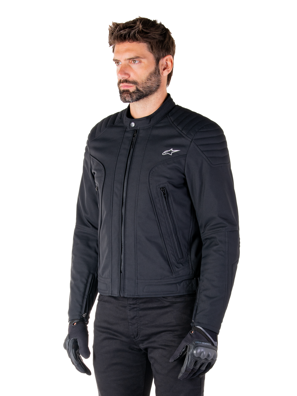 Alpinestars Clayton WR Jacket, Black, urban textile motorcycle jacket with quilted shoulder and forearm details, slim-fit design, matte finish, worn by a rider with black gloves.