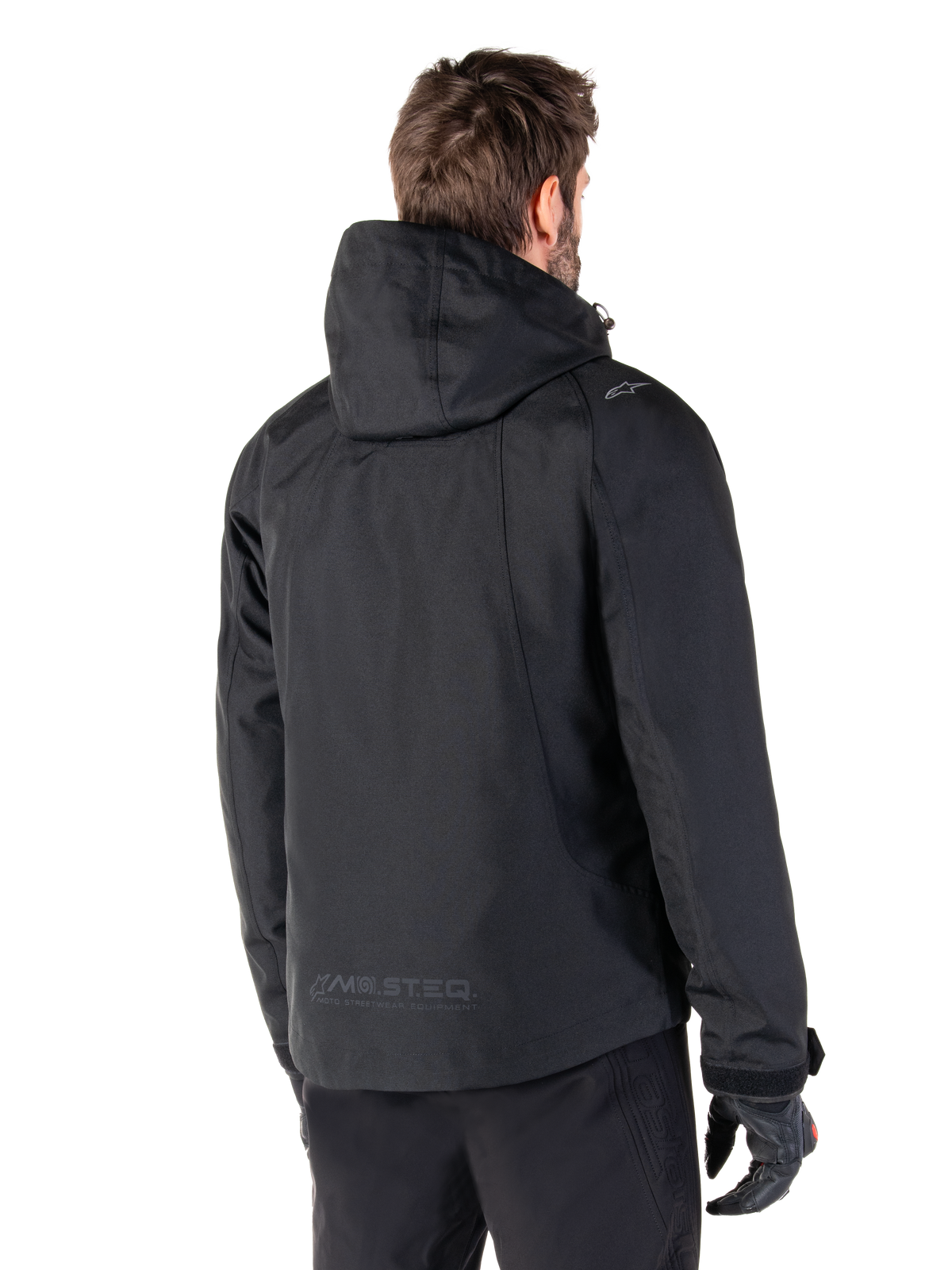 Alpinestars Morush Waterproof Parka, Black Men's Urban Motorcycle Jacket, hooded rear view with MO.ST.EQ. branding.