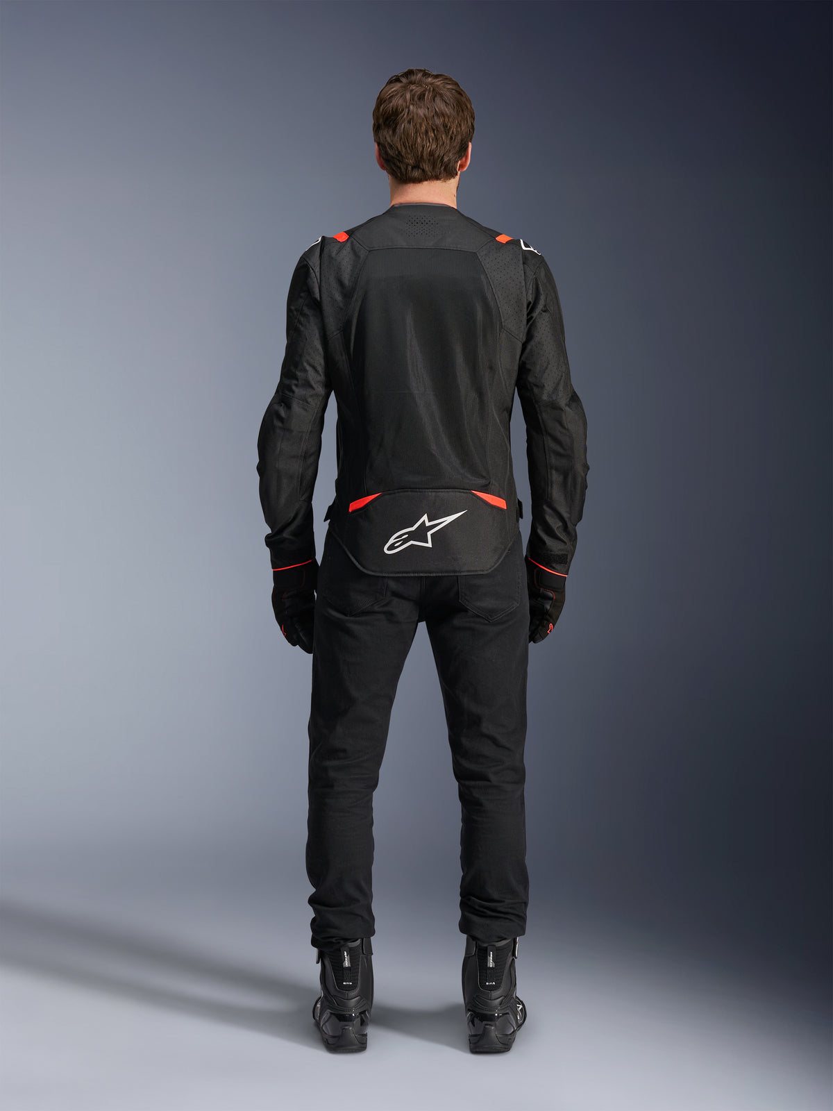 Alpinestars T-SPS Air V2 Jacket, men's road motorcycle jacket, black and red fluo, rear view with textile mesh panels.