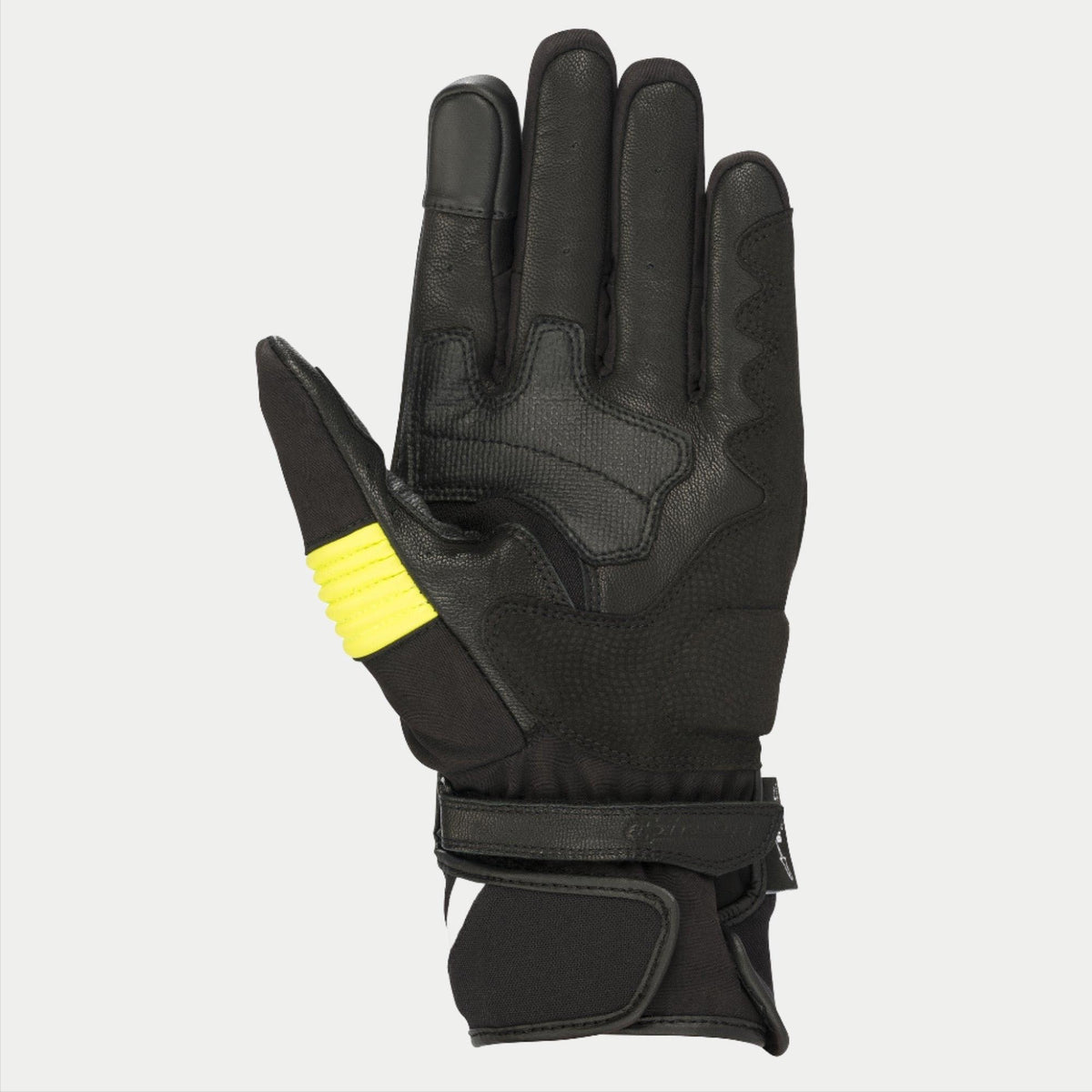 Alpinestars T-SP W Drystar® Gloves, Black and Yellow Fluo, palm view showing goat leather construction with yellow fluorescent accents on the thumb, touchscreen compatible fingertips, and double hook and loop wrist closure.