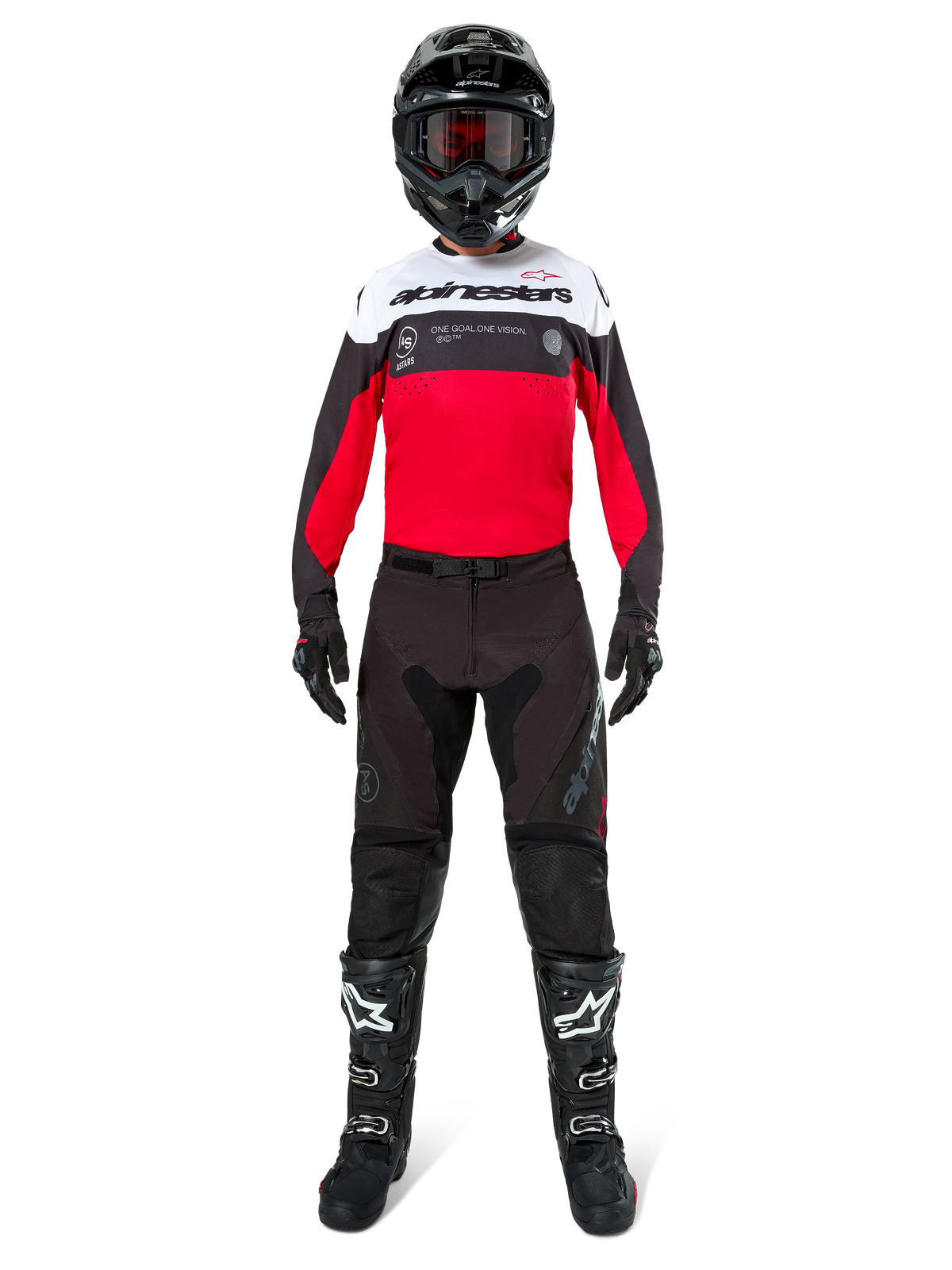 Motocross rider wearing Alpinestars Pro-Dura Pants in Black and Magnet, paired with a red, white, and black jersey, black helmet, and black boots, full off-road racing gear kit, durable and lightweight design for enduro riding