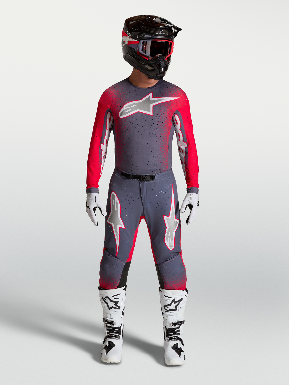 Alpinestars Supertech Hiten AFD Gear Set and Pants, professional motocross outfit in graystone and red fluo.