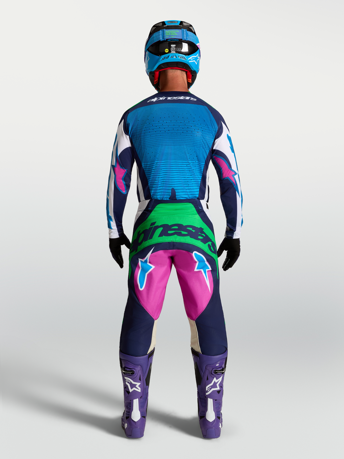 Alpinestars Techstar Maven Gear Set and Pants, Motocross Racing Outfit, Blue and Pink, Men's MX Gear, Back View on Model.