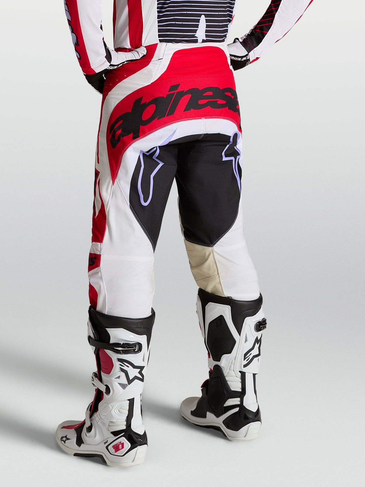 Alpinestars Techstar Maven Pants, Men's Motocross Pants in Fire Red and White, with reinforced seat and athletic race fit.