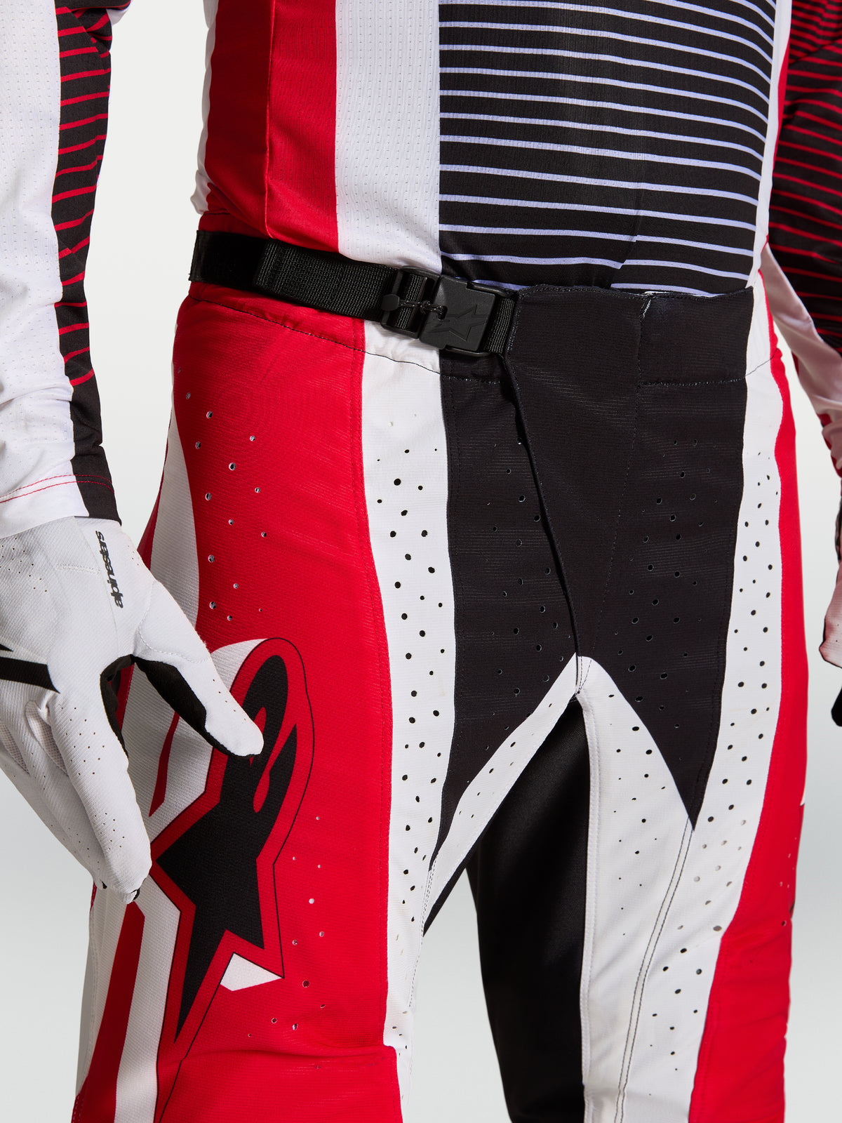 Alpinestars Techstar Maven Motocross Pants, Red and Black, featuring SX2 Magnetic Waist Closure and laser perforations.