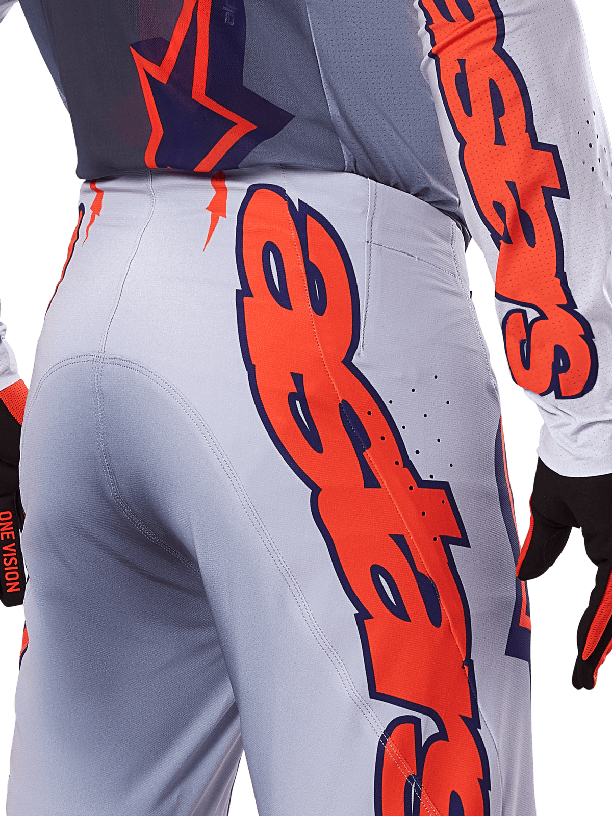 Alpinestars 2025 Supertech Lipan Pants and Jersey, Motocross Gear Set, Gray and Orange Fluo, close-up of the side and back showing large orange Alpinestars branding, performance rip-stop fabric with perforated ventilation