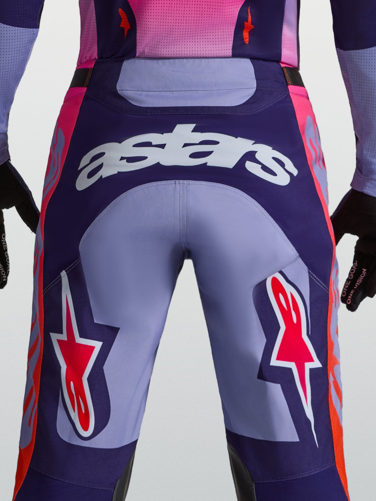 Alpinestars Racer Air Hunt Pants, Purple Motocross Racing Pants, rear view on model showing astars logo and ventilated construction.