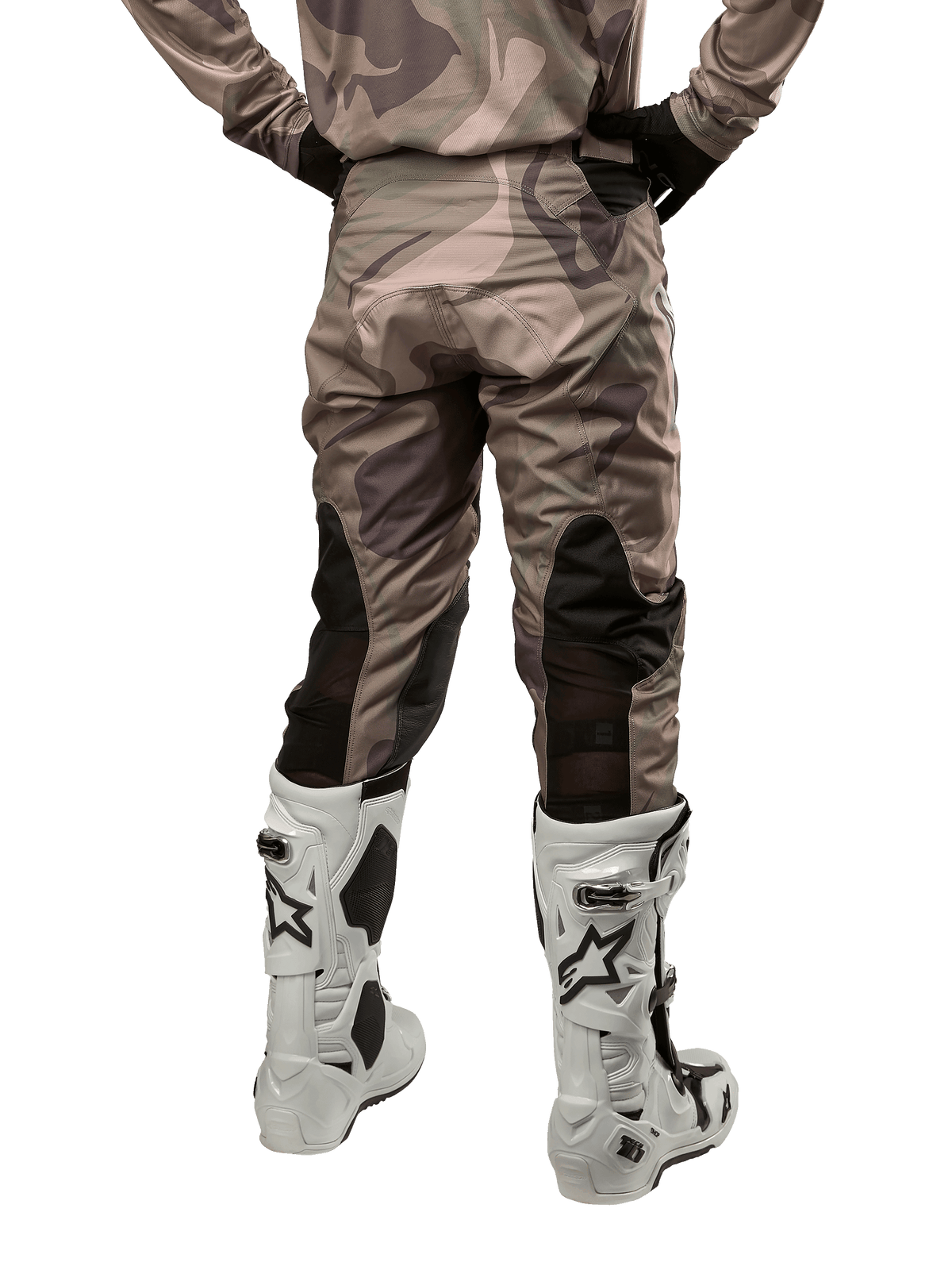 Alpinestars 2024 Racer Tactical Pants, Motocross Pants, Military Green Camo Brown, back view showing camouflage pattern and black breathable stretch panels on the lower legs, worn with white motocross boots, durable technical gear for off-road riding