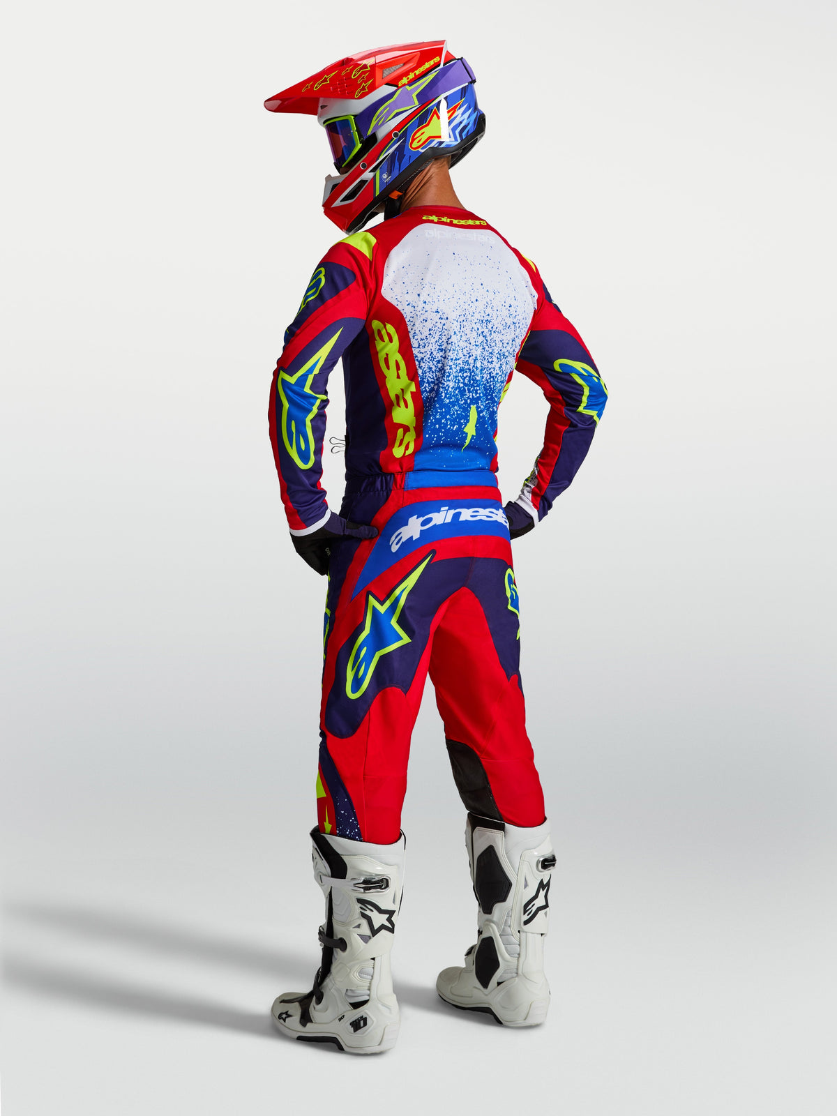 Alpinestars 2027 Fluid Drag Gear Set and Pants, Motocross Racing Outfit, Blue Navy, Fire Red, and White, Rear View.