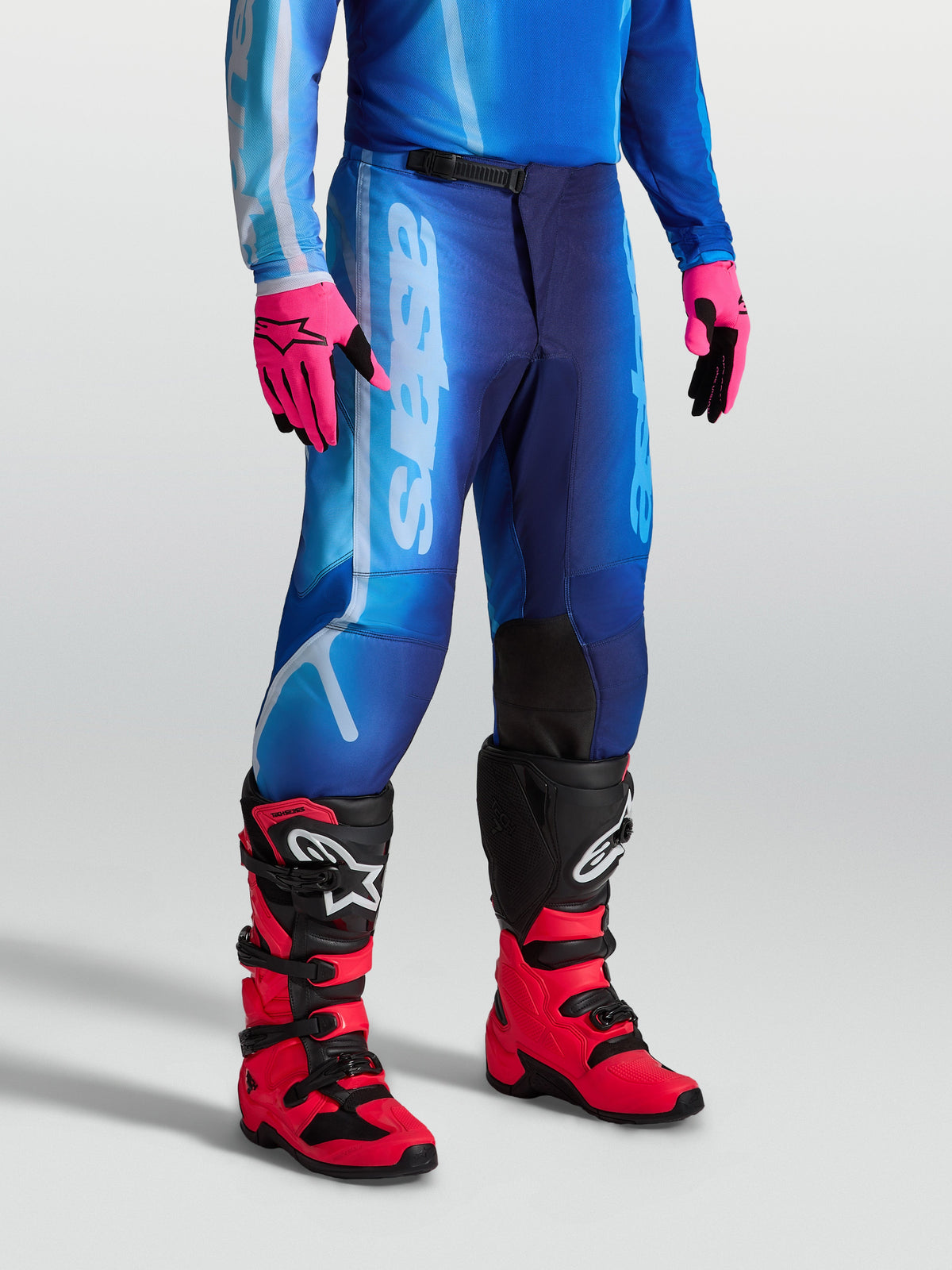 Alpinestars Fluid Kepler Men's Motocross Pants in Ucla Blue and Blithe Blue, featuring pre-curved legs and 600D polyfabric.