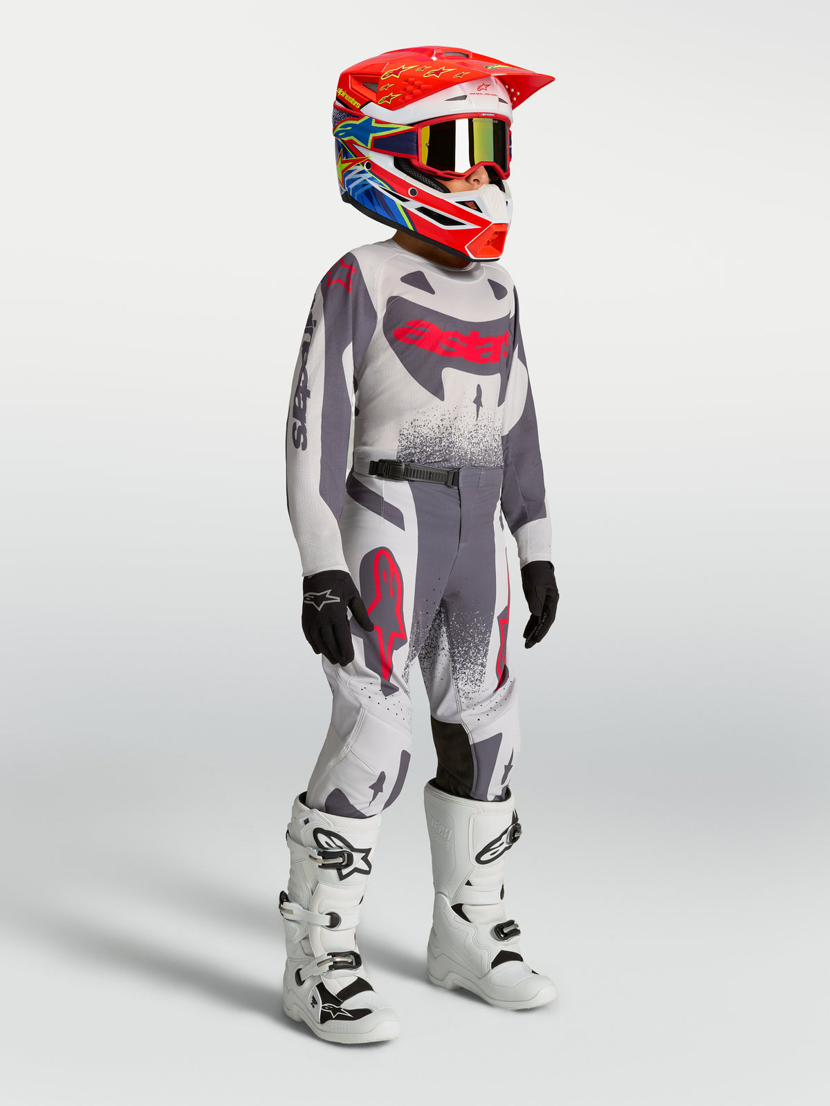 Alpinestars Youth Supertech Swan Pants, premium motocross gear for young riders, Gray and Red Fluo, durable stretch construction.