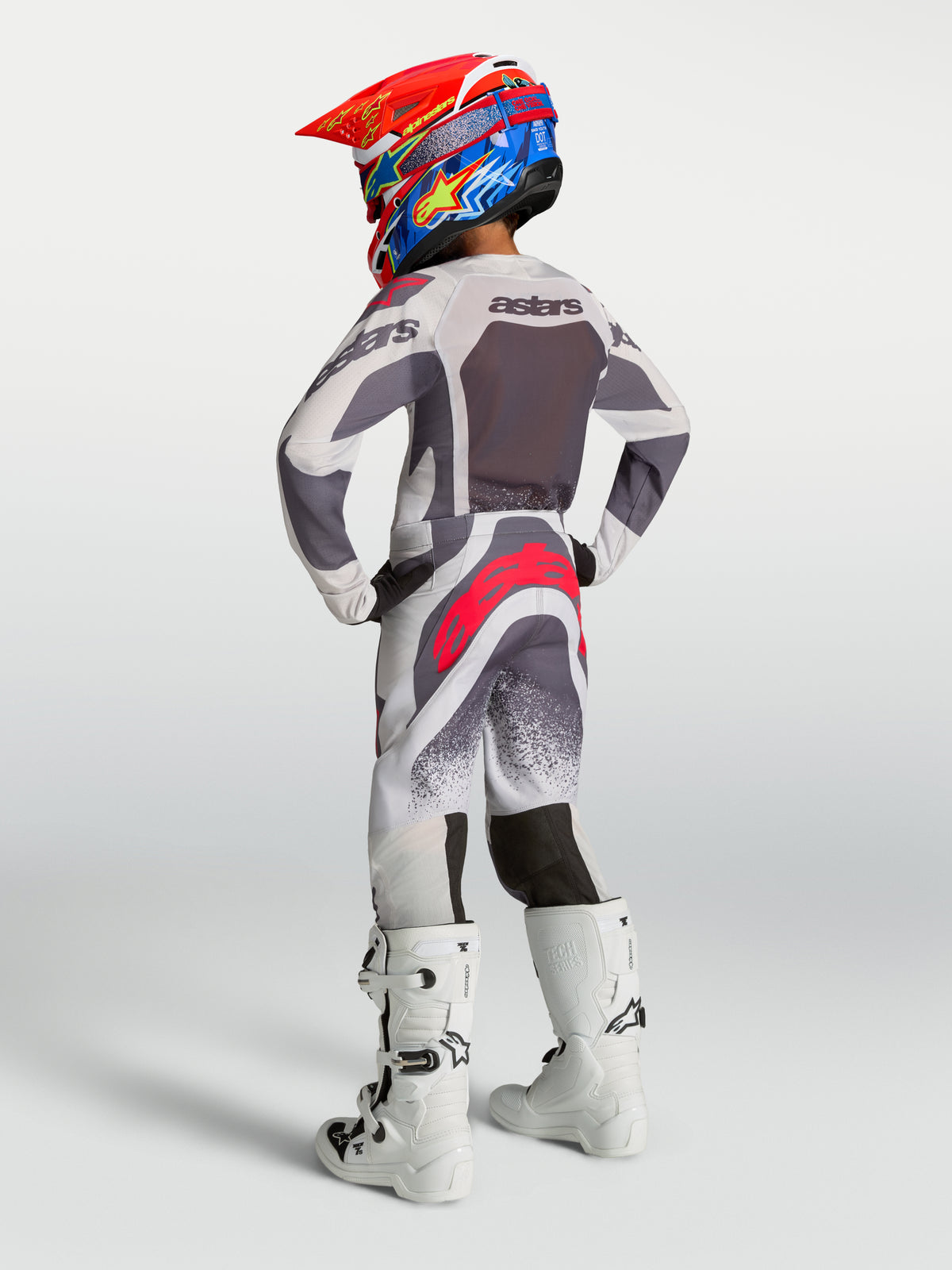Alpinestars Youth Supertech Swan Pants, rear view of gray and red motocross racing gear with a durable athletic fit.