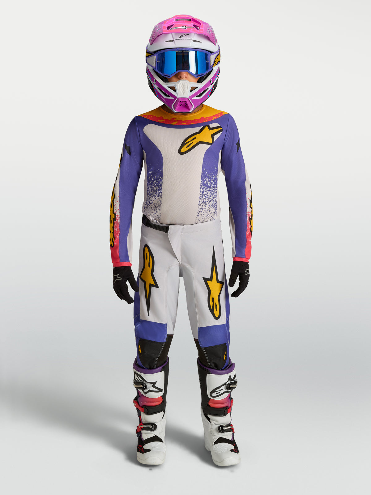 Alpinestars Youth Fluid Drag Pants, purple and white motocross gear set for youth off-road riding with gold accents.