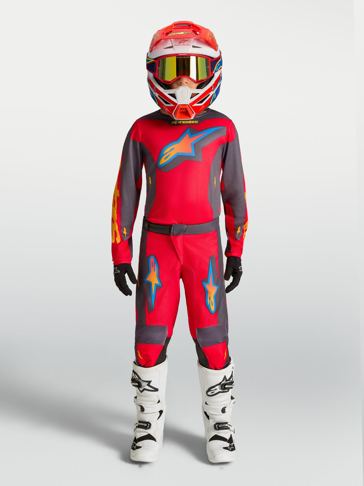 Alpinestars Youth Fluid Hunt Pants, Red and Graystone Motocross gear with a durable sport fit for off-road performance.