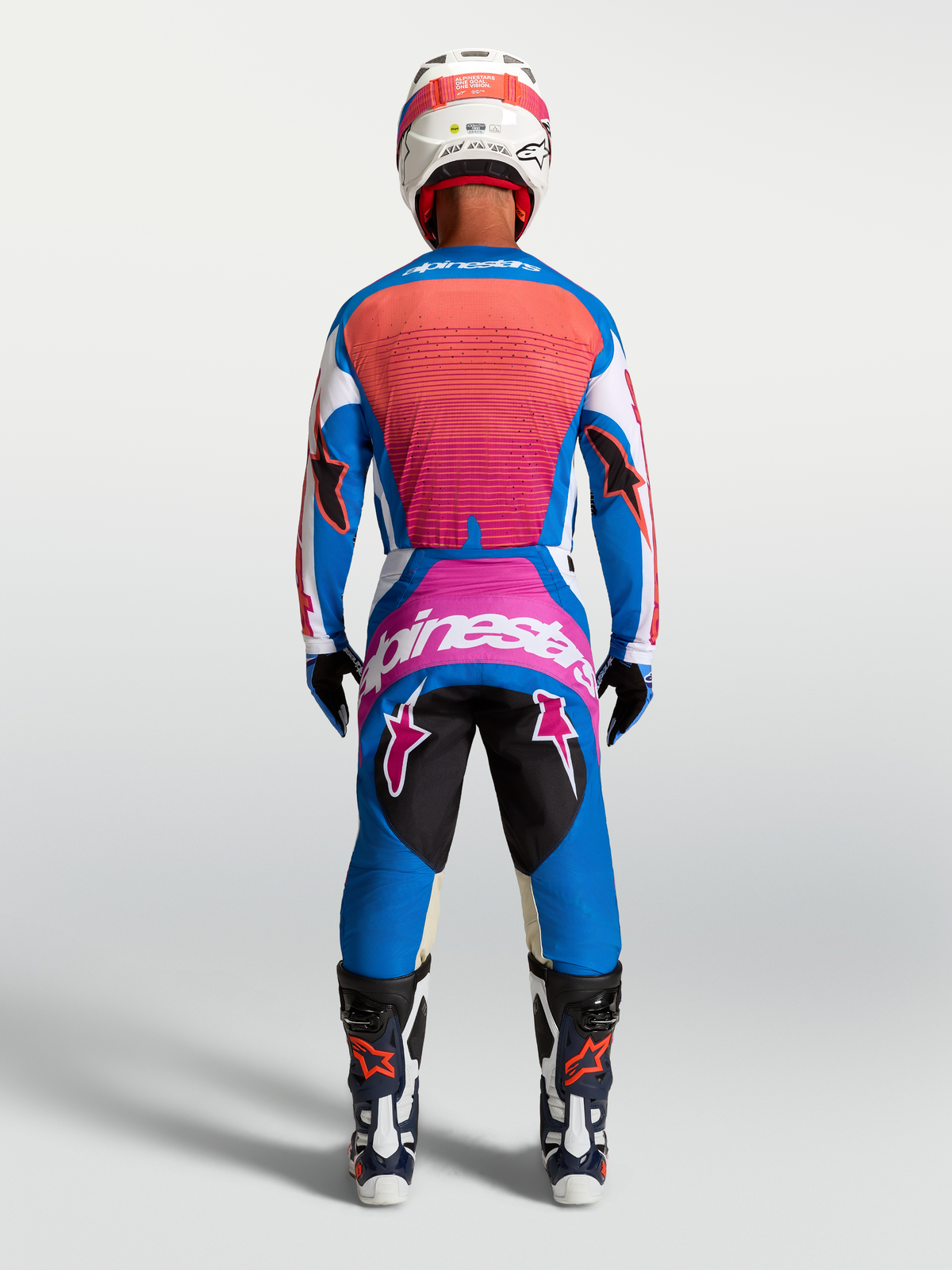 Alpinestars Techstar Maven Jersey AND Techstar Maven Gear Set, blue and hot coral motocross racing gear, back view.