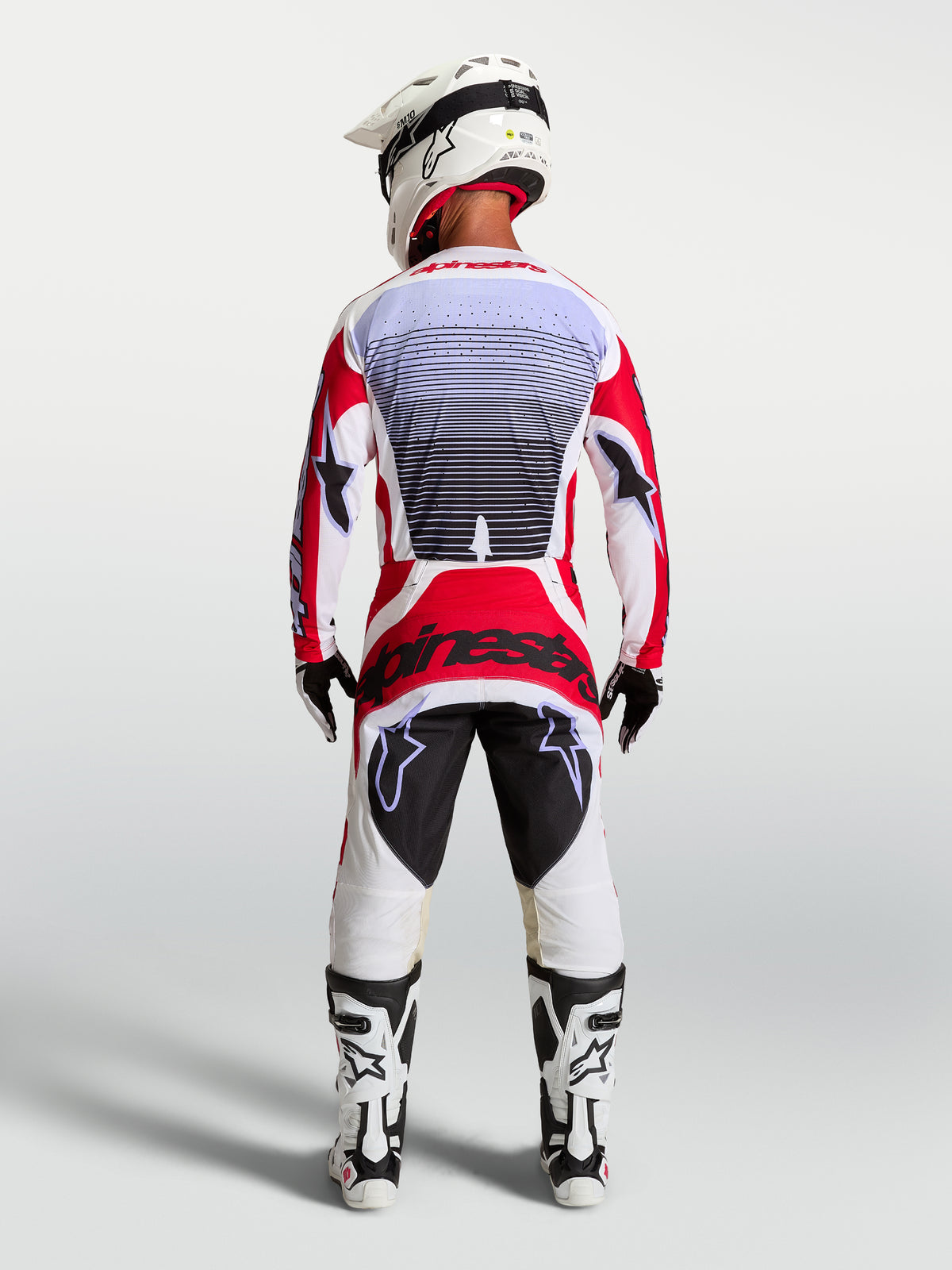 Alpinestars Techstar Maven Motocross Gear Set, Men's Fire Red and White racing jersey and pants, athletic fit, rear view.