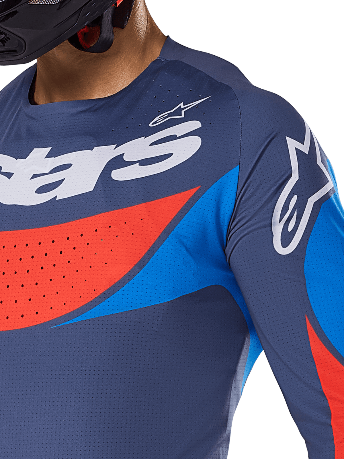 Close-up of Alpinestars 2025 Techstar Dreem Jersey, navy blue with vibrant blue and orange accents, white Alpinestars branding on chest and shoulder, featuring laser-cut perforations for ventilation