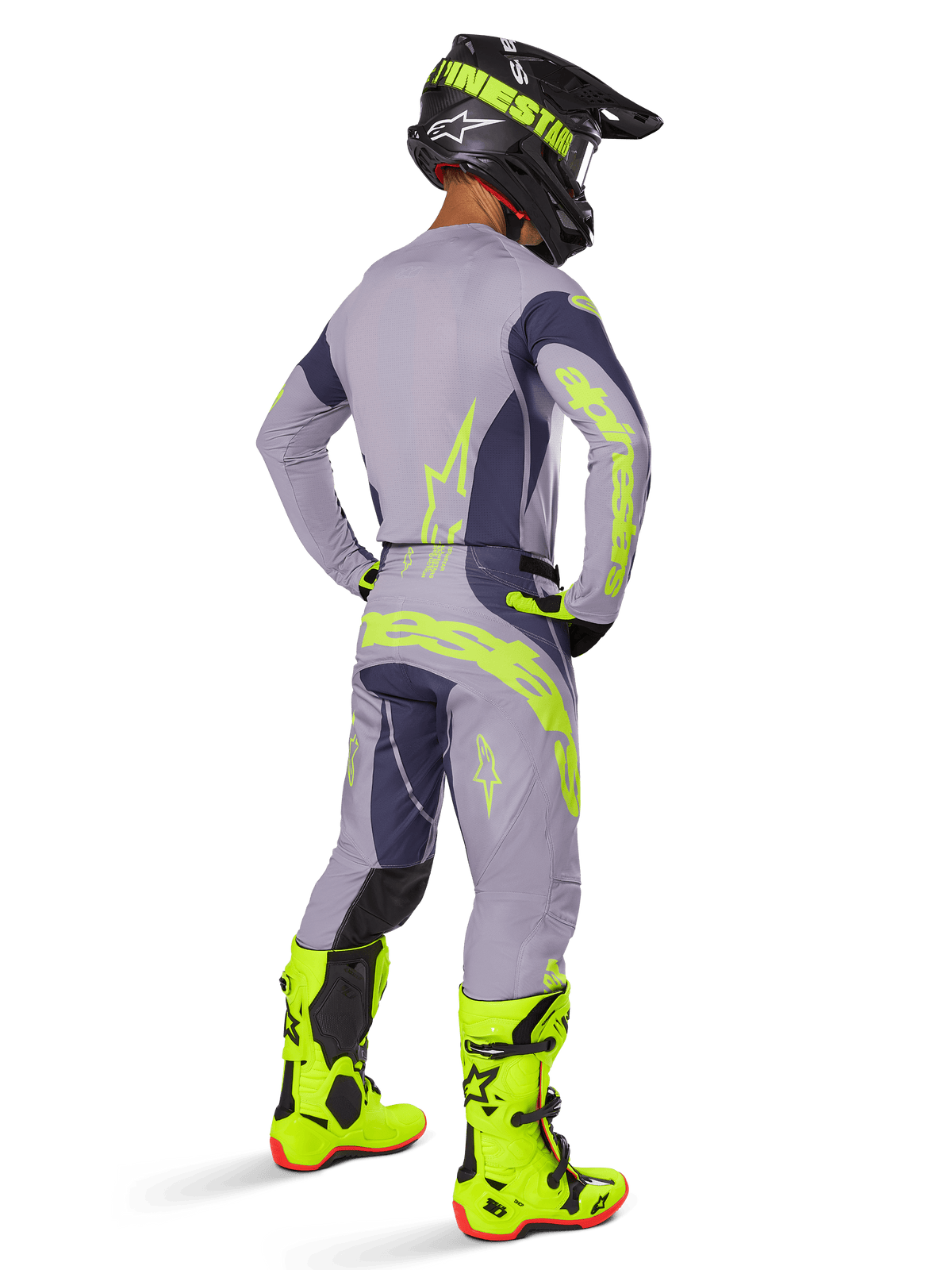 Alpinestars 2025 Techstar Dreem Jersey, Motocross Jersey, Gray and Dark Gray, worn with matching pants and bright neon yellow boots, back view showing neon yellow branding and athletic fit for off-road racing
