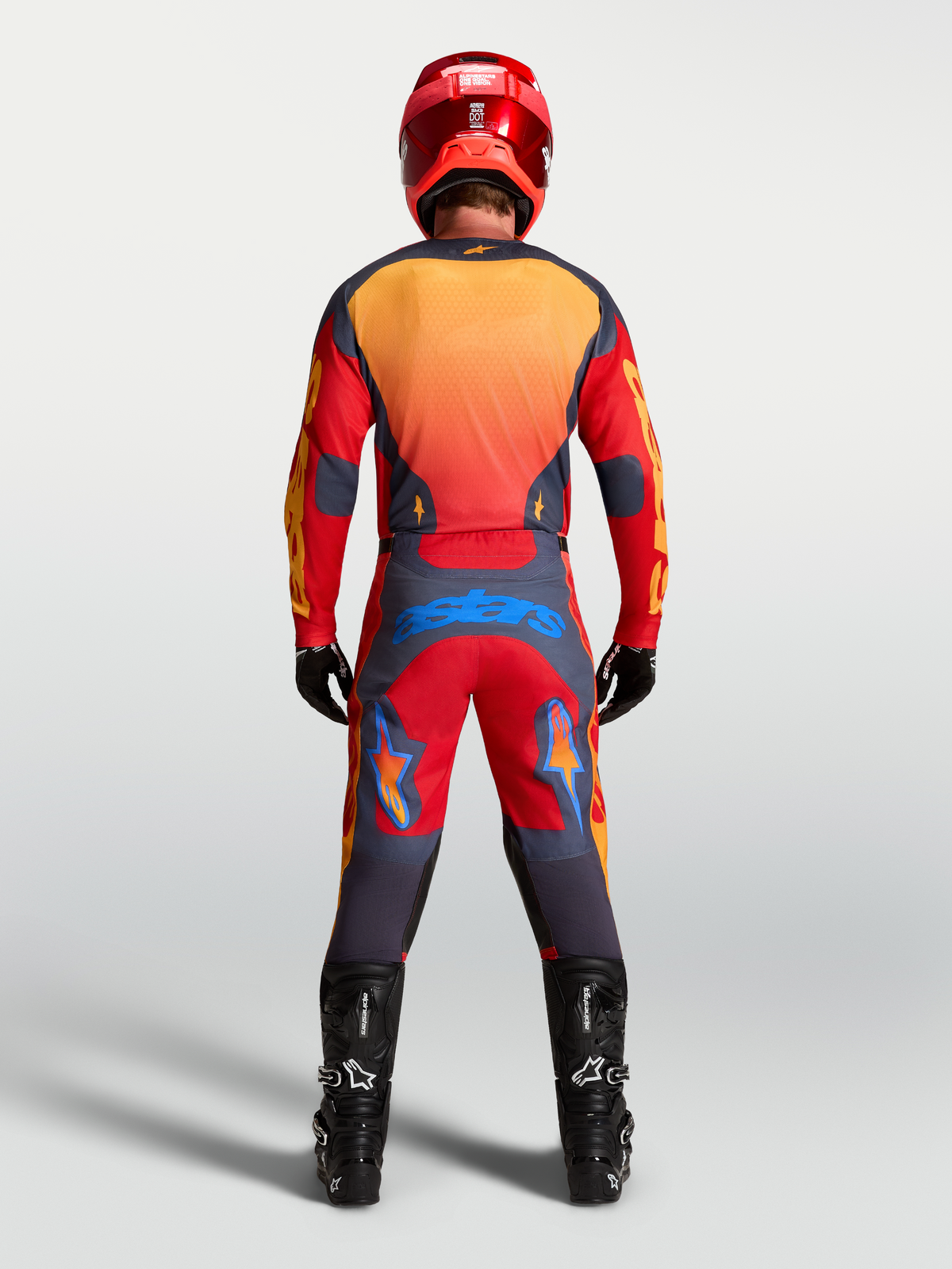 Alpinestars Racer Hunt Jersey, Men's Motocross Gear, Red and Graystone, moisture-wicking textile, rear view on rider.