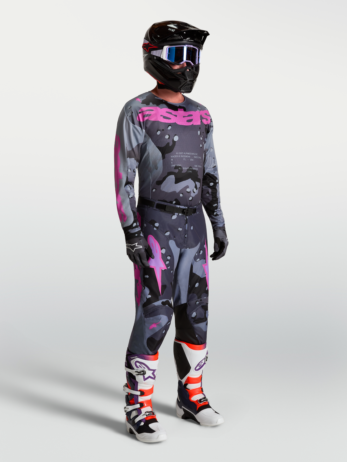 Alpinestars Racer Lone Pants and matching jersey, men's motocross racing set in gray camo and purple.
