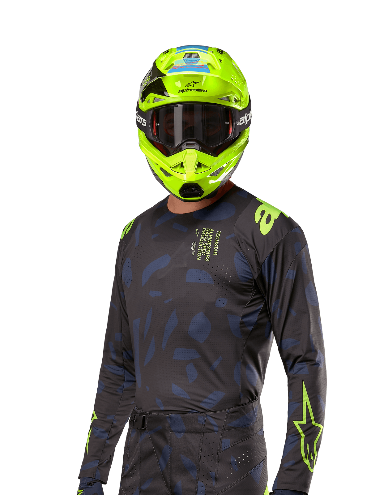Alpinestars 2024 Techstar Rantera Jersey, motocross racing jersey, black and navy with abstract patterns and neon yellow accents, worn with matching neon yellow helmet, performance fit design for off-road riding