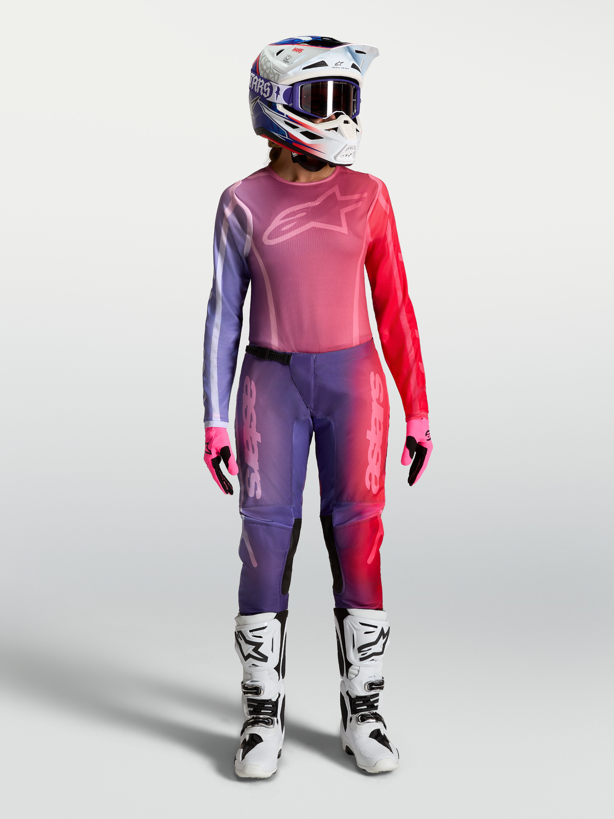 Alpinestars Stella Fluid Kepler Jersey, Women's Motocross Gear in Purple and Red, featuring matching pants, helmet, and boots.