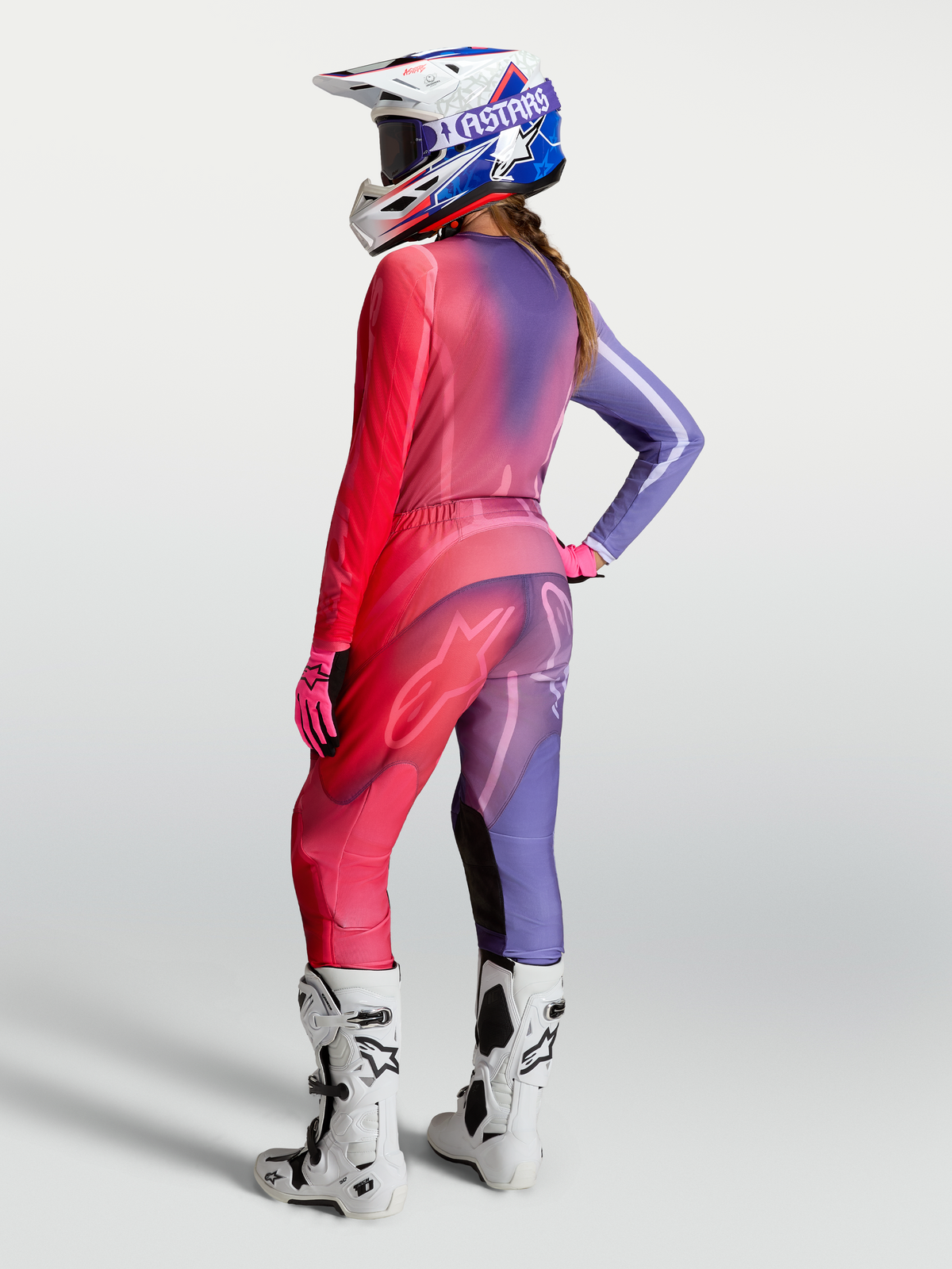 Alpinestars Stella Fluid Kepler Pants and Gear Set, purple and rouge red women's motocross racing outfit on-model.