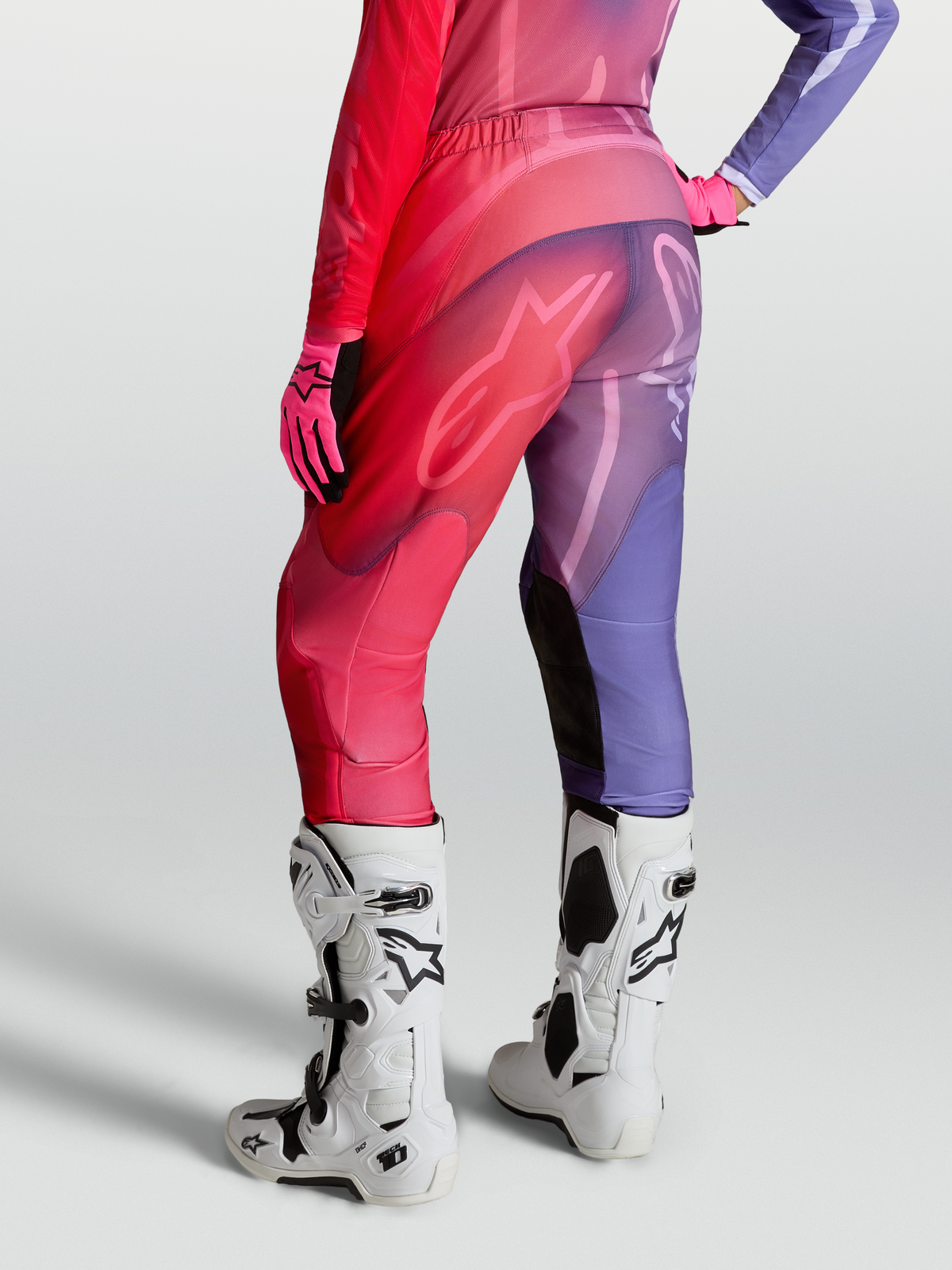 Alpinestars Stella Fluid Kepler Pants, women's purple and red motocross pants with pre-curved legs and stretch panels.