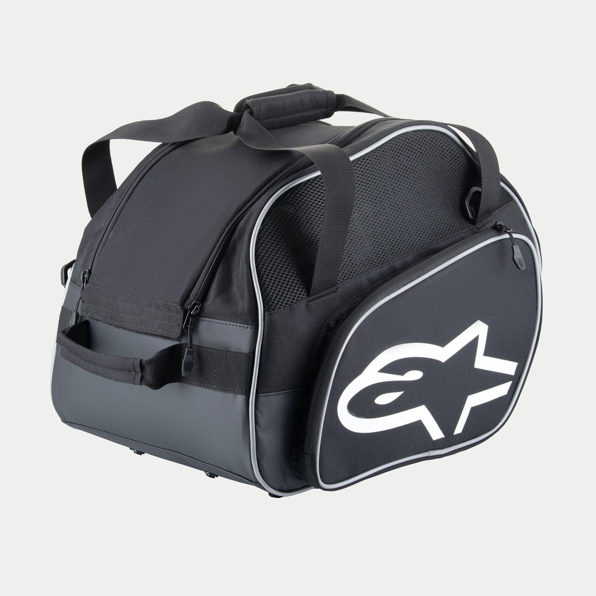 Alpinestars Flow V3 Helmet Bag, Protective Storage for Full-Face Helmets, Black and White, featuring a large white logo on the side, mesh ventilation panels, and reinforced grab handles, durable polyester design for racing gear.