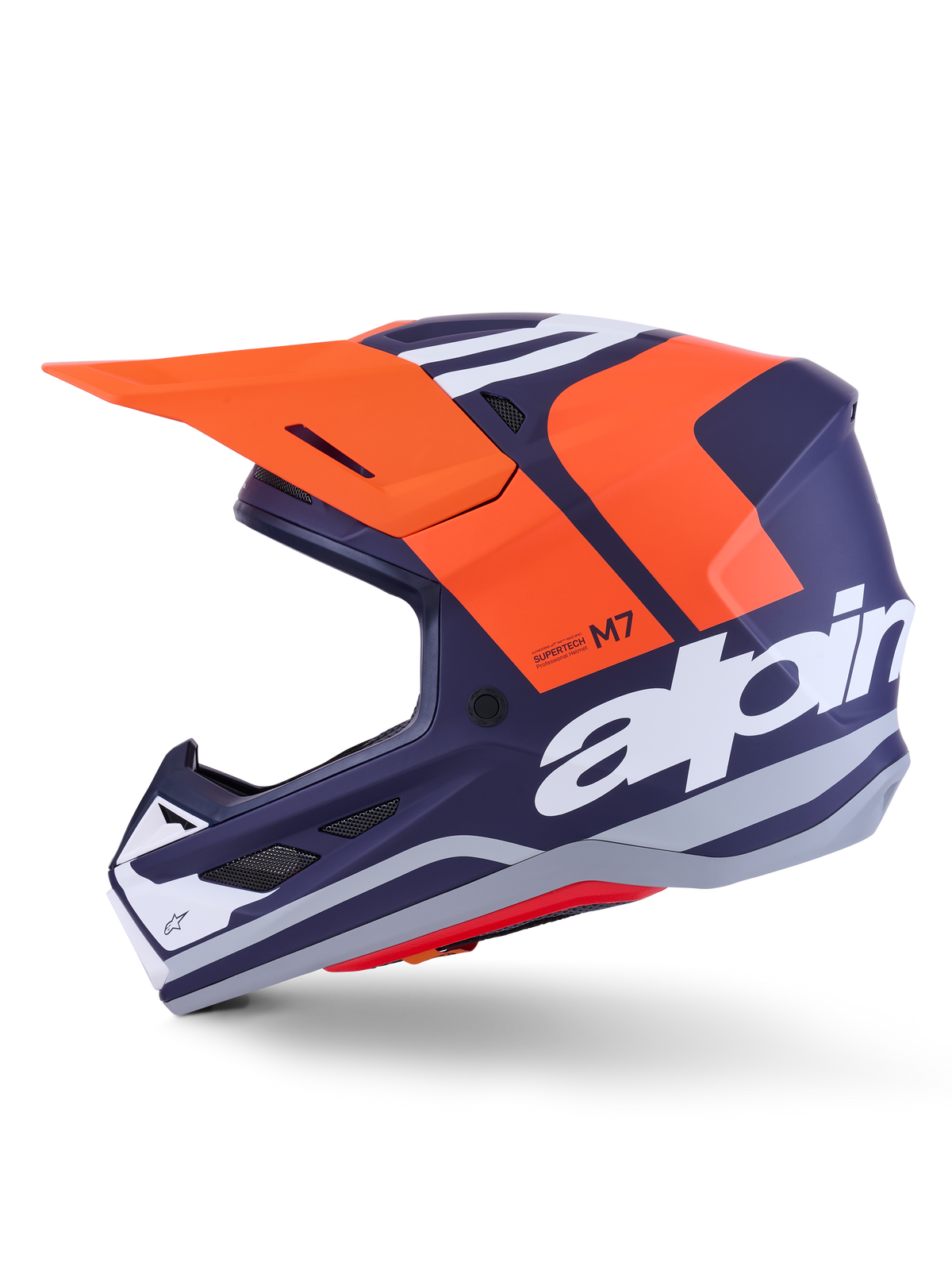 Alpinestars S-M7 Core Helmet ECE 22.06, side profile, navy blue and orange matte finish, large white branding on side, aerodynamic motocross helmet with protective visor