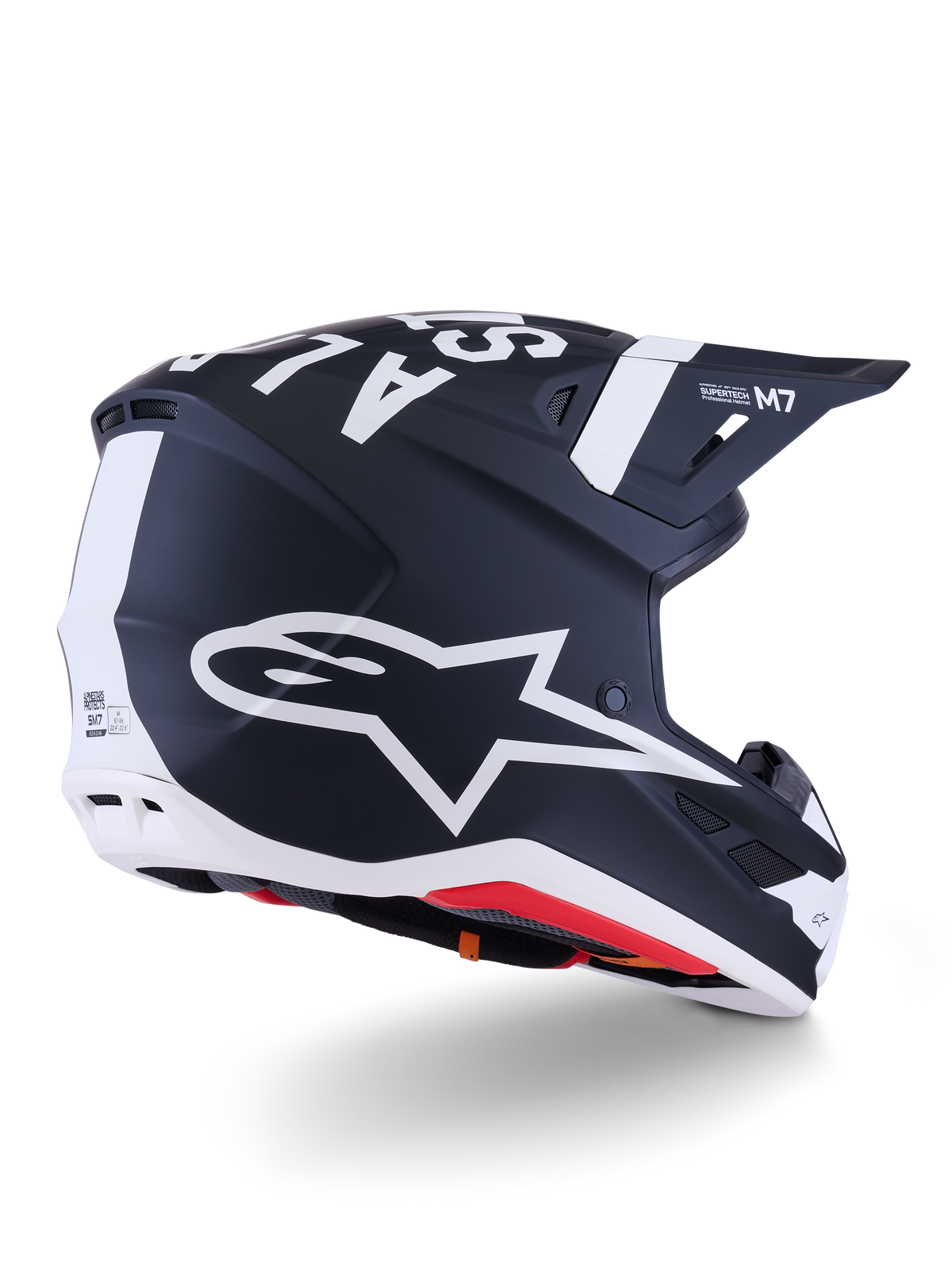 Alpinestars S-M7 Dasher Helmet, Motocross Helmet, Matte Black and White, rear three-quarter view featuring large white A-star logo on the side, bold white branding on top, aerodynamic shell design with visible ventilation ports and red padding.