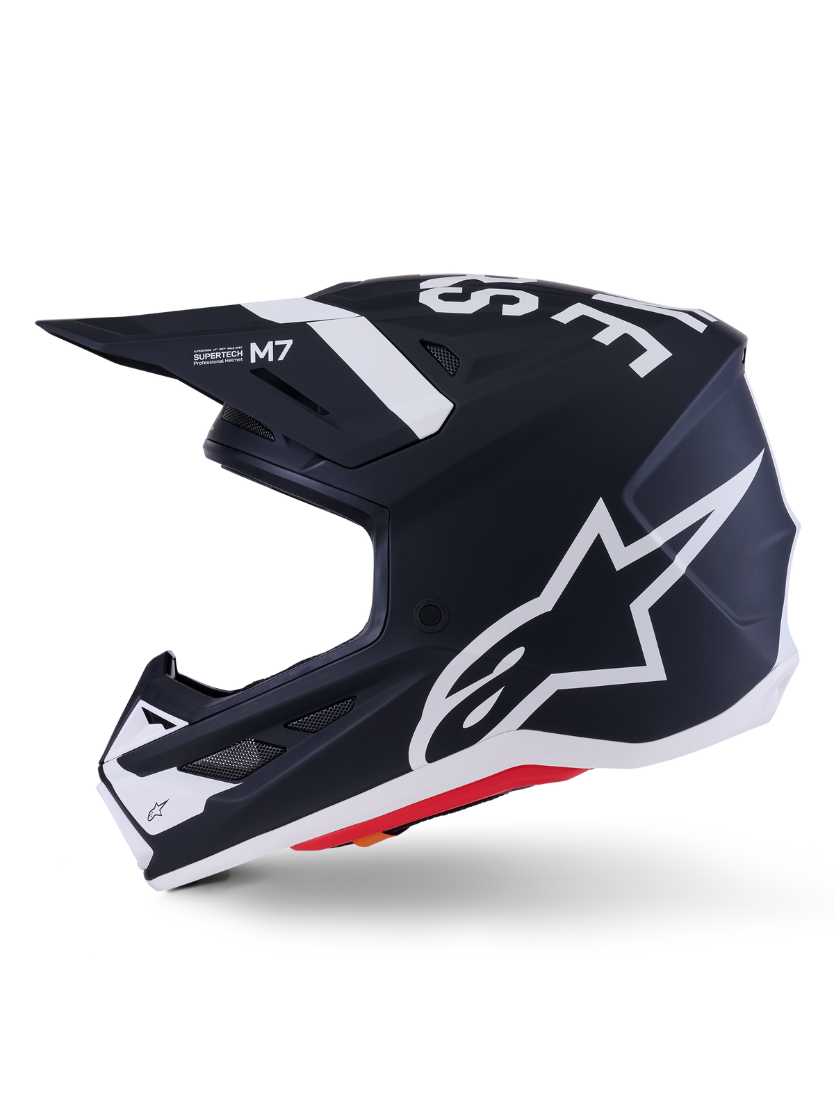 Alpinestars S-M7 Dasher Helmet ECE 22.06, Matte Black and White, side profile featuring large white Alpinestars logo, aerodynamic composite shell with ventilation ports and red base trim, professional motocross head protection