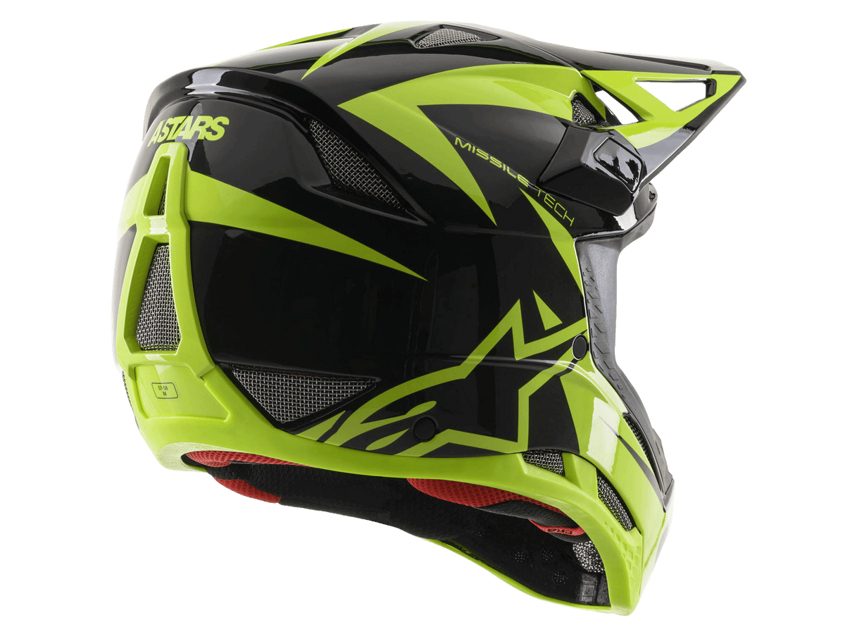 Alpinestars Missile Tech-Air Full Face Helmet, Black and Yellow Fluo Glossy, rear three-quarter view featuring large mesh ventilation ports, ASTARS branding, and red interior lining, designed for downhill MTB performance.
