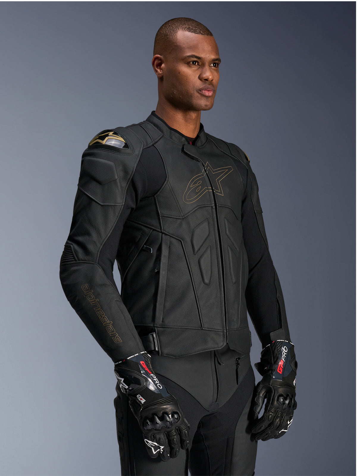 Alpinestars Dusk Leather Jacket, Men's Black Laser leather jacket with DFS shoulder protection and gold logo outline.