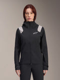 Alpinestars Stella A-Dura Rain Jacket, Women's Cycling Rain Jacket, Black with light gray shoulder panels, hooded technical shell with white logo on chest, adjustable Velcro cuffs, professional gear for MTB and wet weather riding