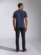 Alpinestars Ride 4.0 CSF Tee, Short Sleeve T-Shirt, Navy, back view on model, paired with black jeans, casual motorsport-inspired streetwear