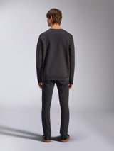 Alpinestars Positive Crew, Black Pullover Sweatshirt, back view on male model, worn with black jeans and casual sneakers, featuring ribbed cuffs and hem, motorsport-inspired streetwear