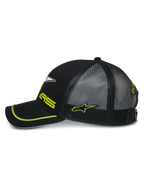 Alpinestars Exceed Trucker Hat, side profile of a black snapback cap, featuring a black mesh back, curved bill with neon green piping, neon green embroidered logos, casual motorsport headwear