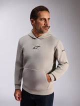 Alpinestars Insight Hoodie, casual lifestyle streetwear, Cement gray fleece, front black Astars logo, kangaroo pocket, sleeve wordmark, mesh-lined hood, modern motorsport-inspired apparel