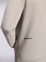 Alpinestars Cypher Hoodie, double face fleece zip hoodie, Cement Gray, close-up of small black Alpinestars word logo on the lower back, detail of on-seam pocket and smooth fabric texture