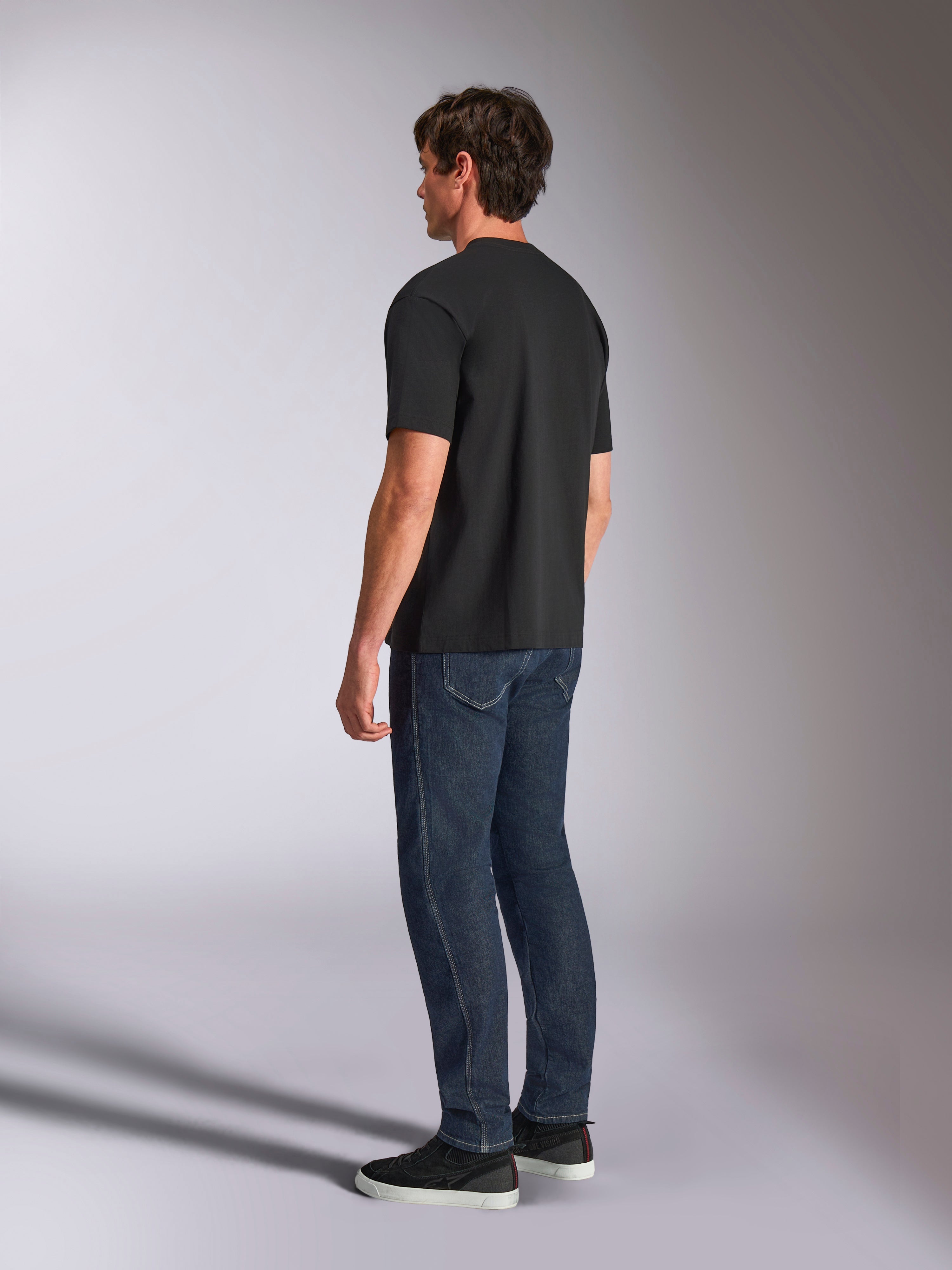 Alpinestars Aplomb Oversized CSF Tee, Short Sleeve T-Shirt, Black, back view on model, casual motorsport-inspired streetwear, relaxed oversized fit